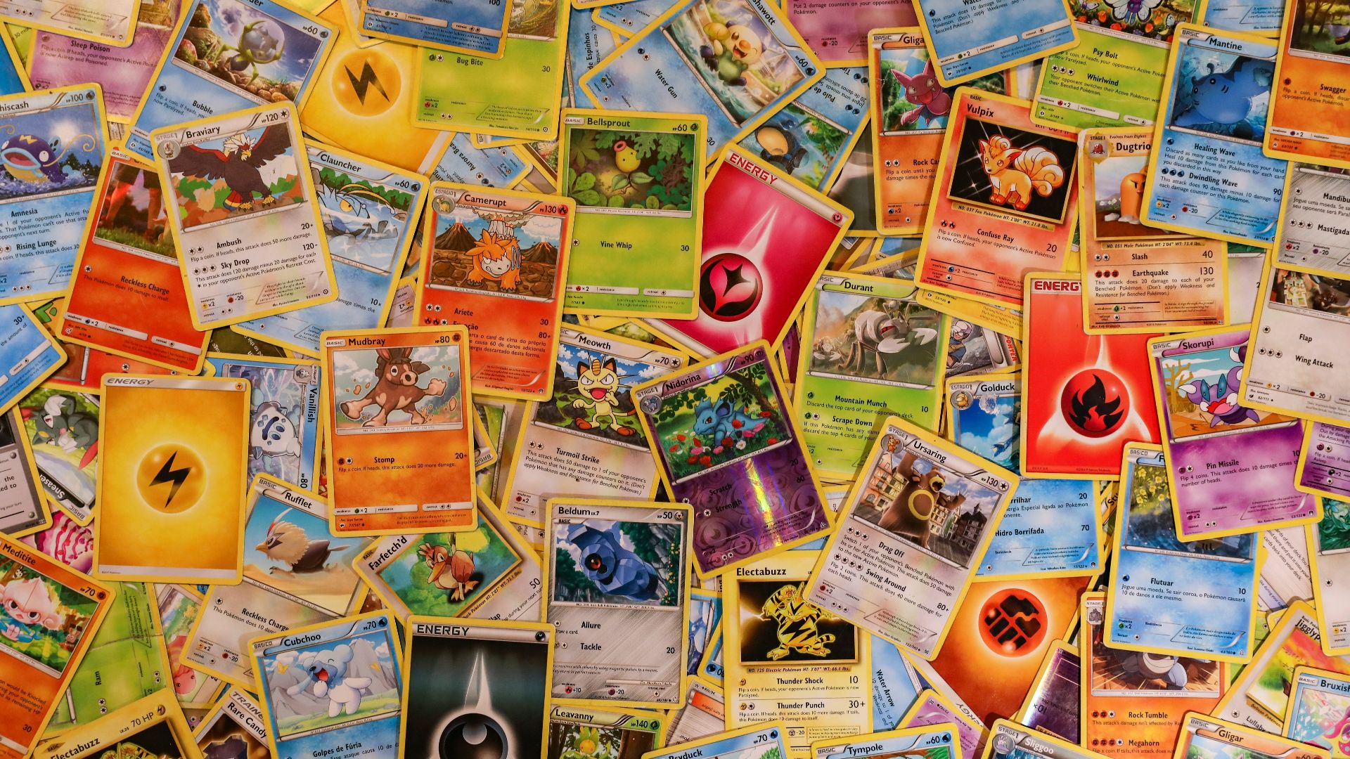 red ceramic mug on brown wooden table