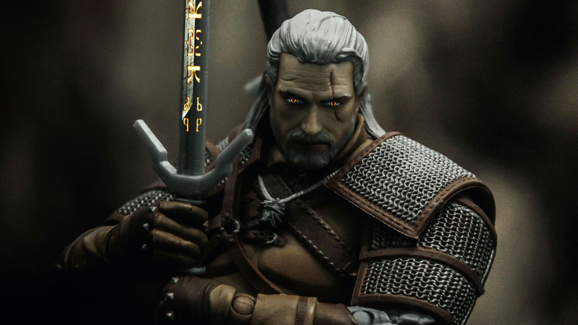 man in black and brown suit holding sword