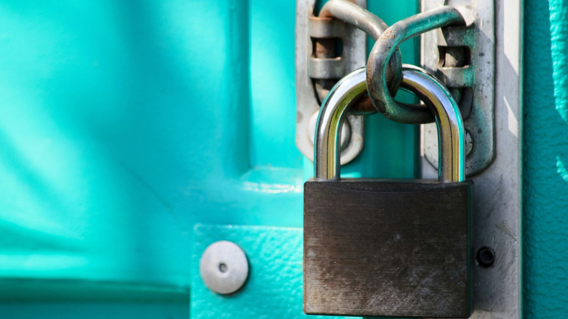 a close up of a padlock on a door