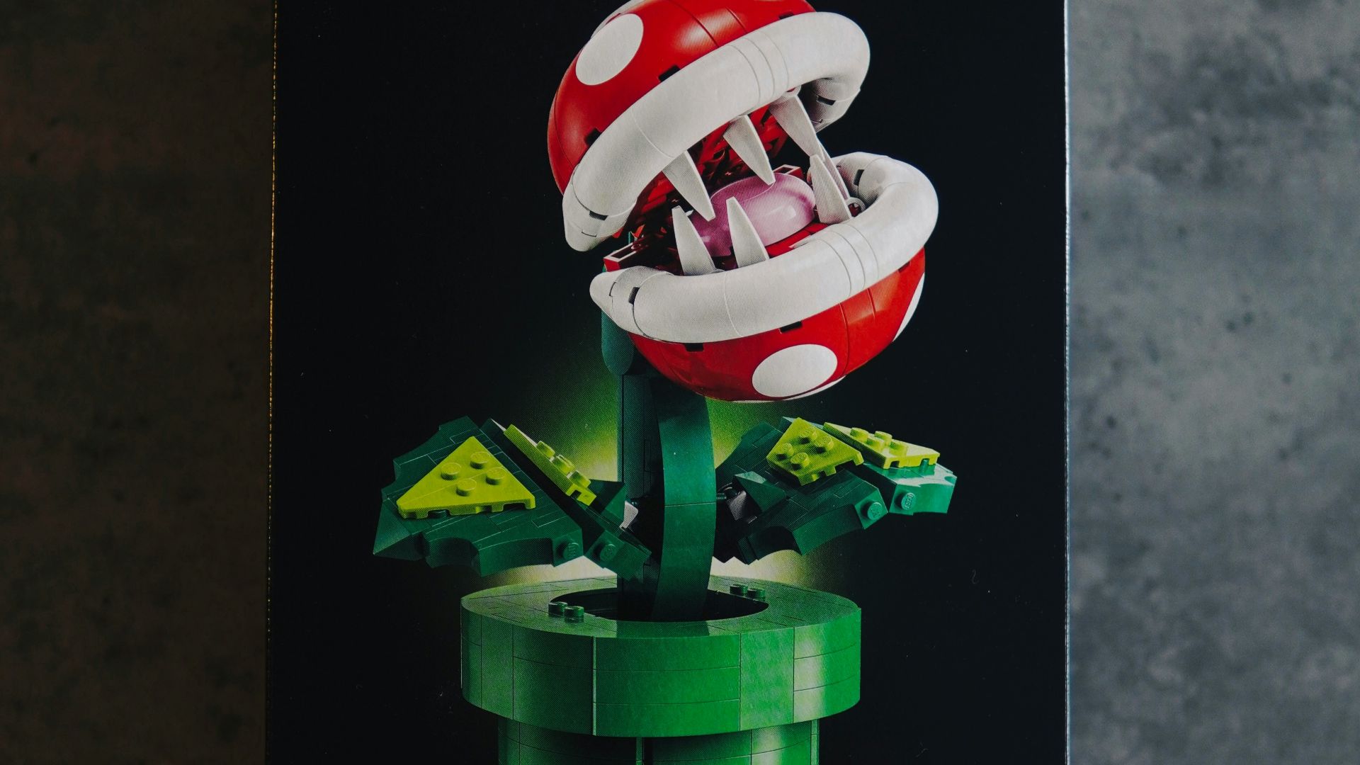 a box of legos with a mushroom on top of it