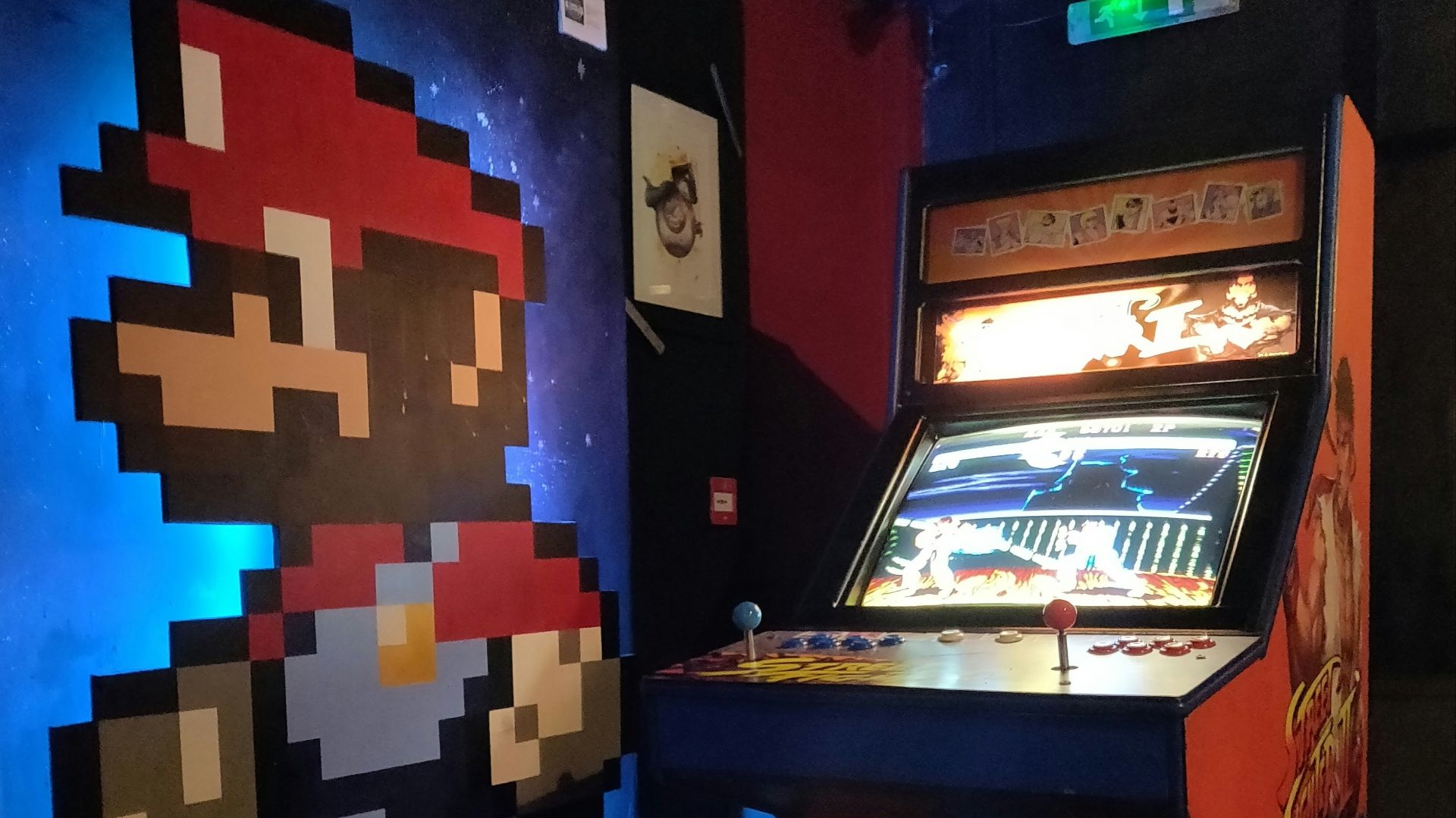 black and red arcade machine