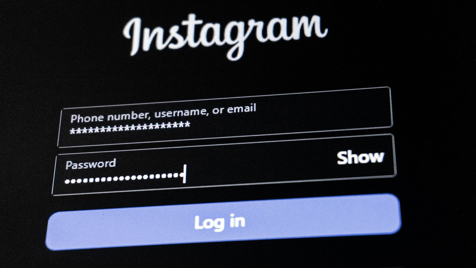 Instagram login screen with fields for username and password.