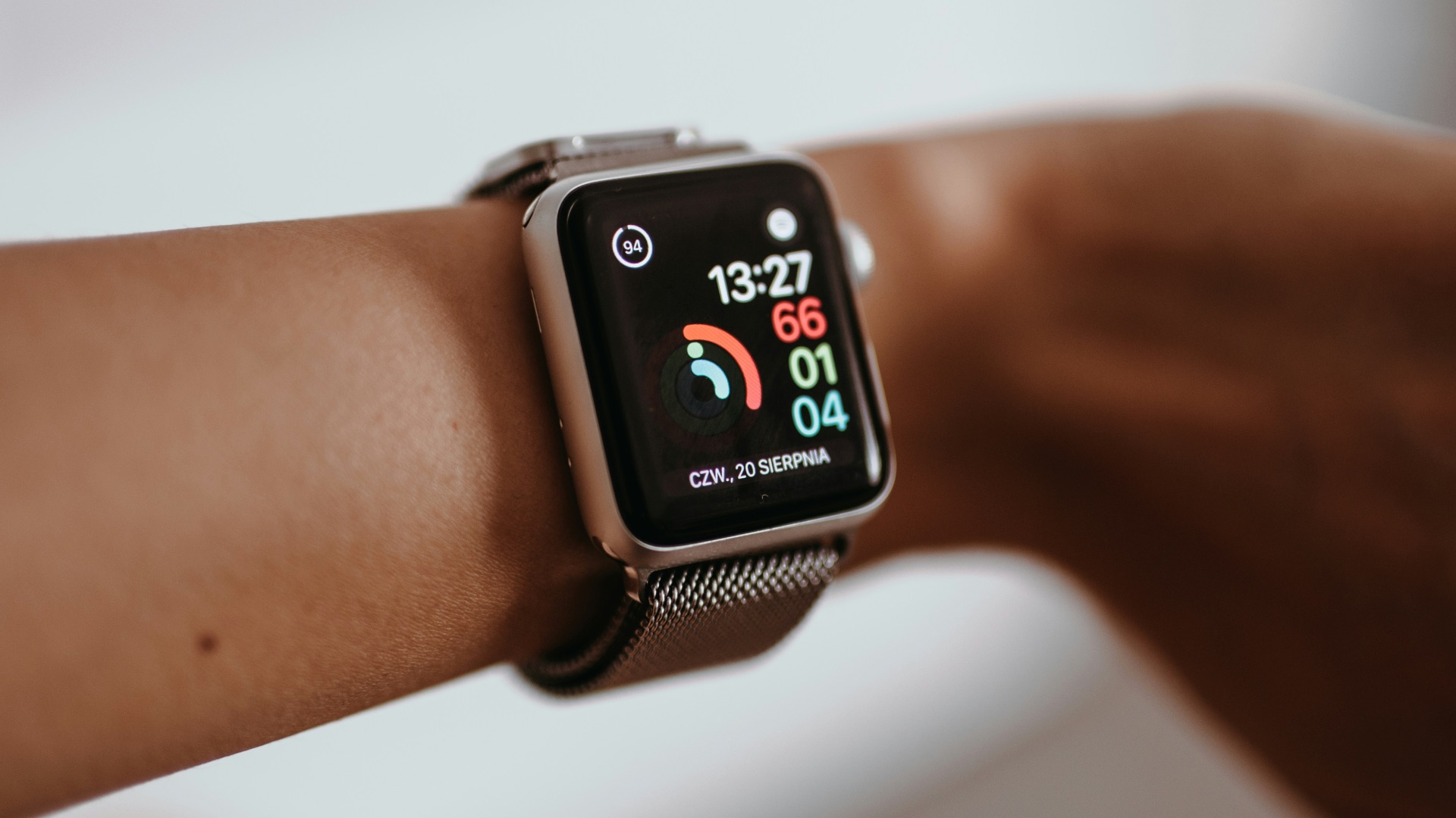 silver aluminum case apple watch with white nike sport band