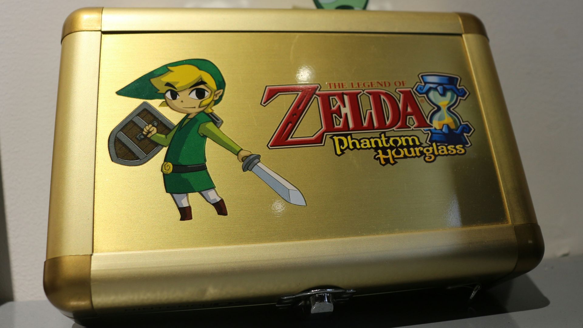 A nintendo wii game system sitting on top of a desk