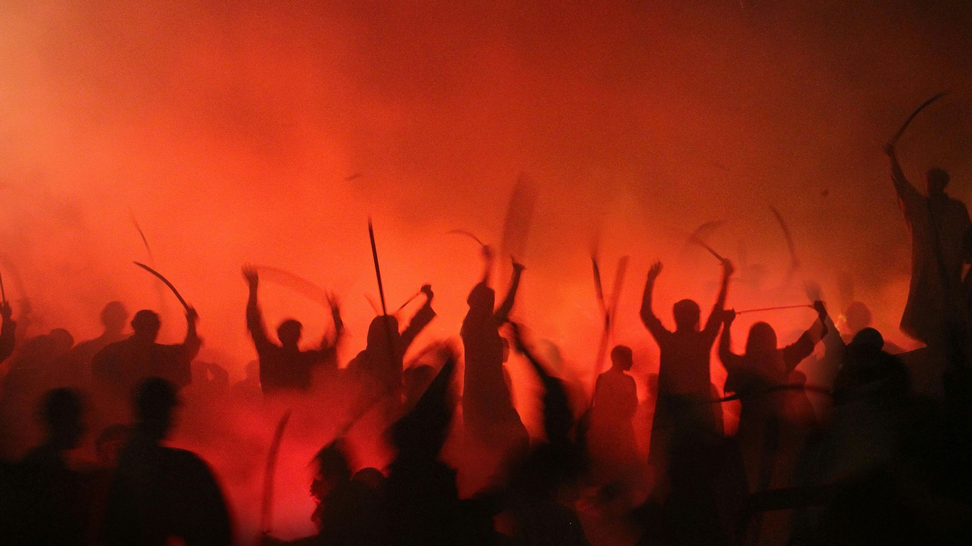 people gathering on street during nighttime