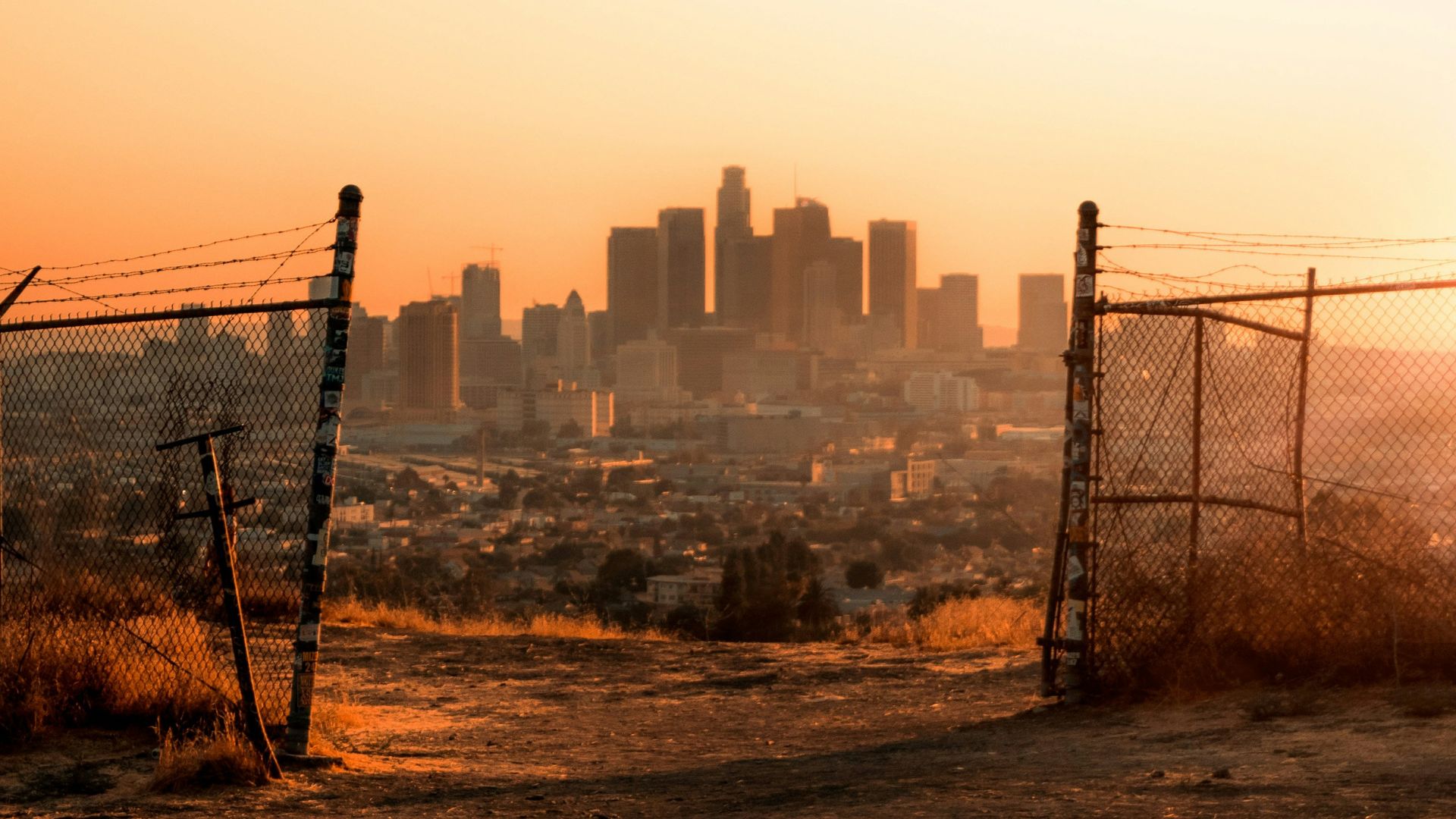 black metal fence near building during daytime