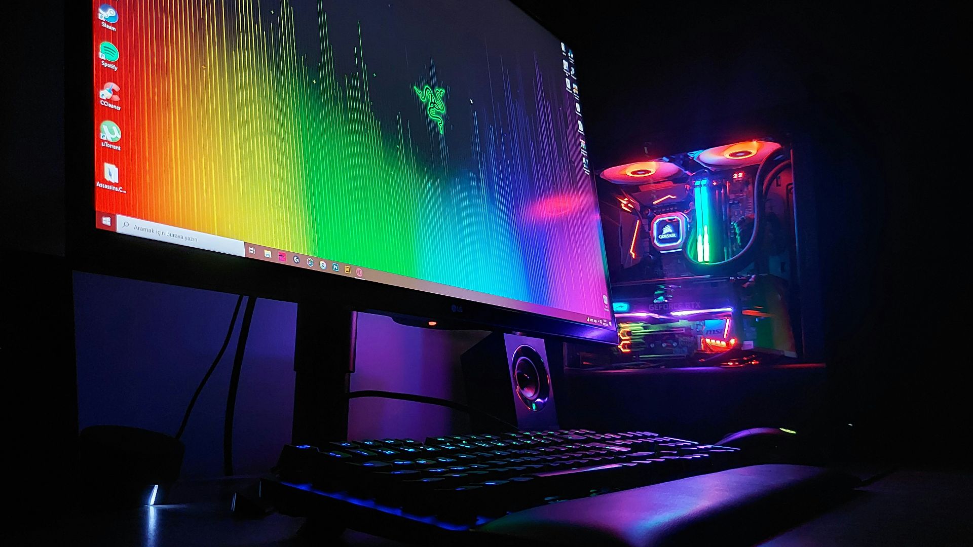 black flat screen computer monitor turned on beside black computer keyboard