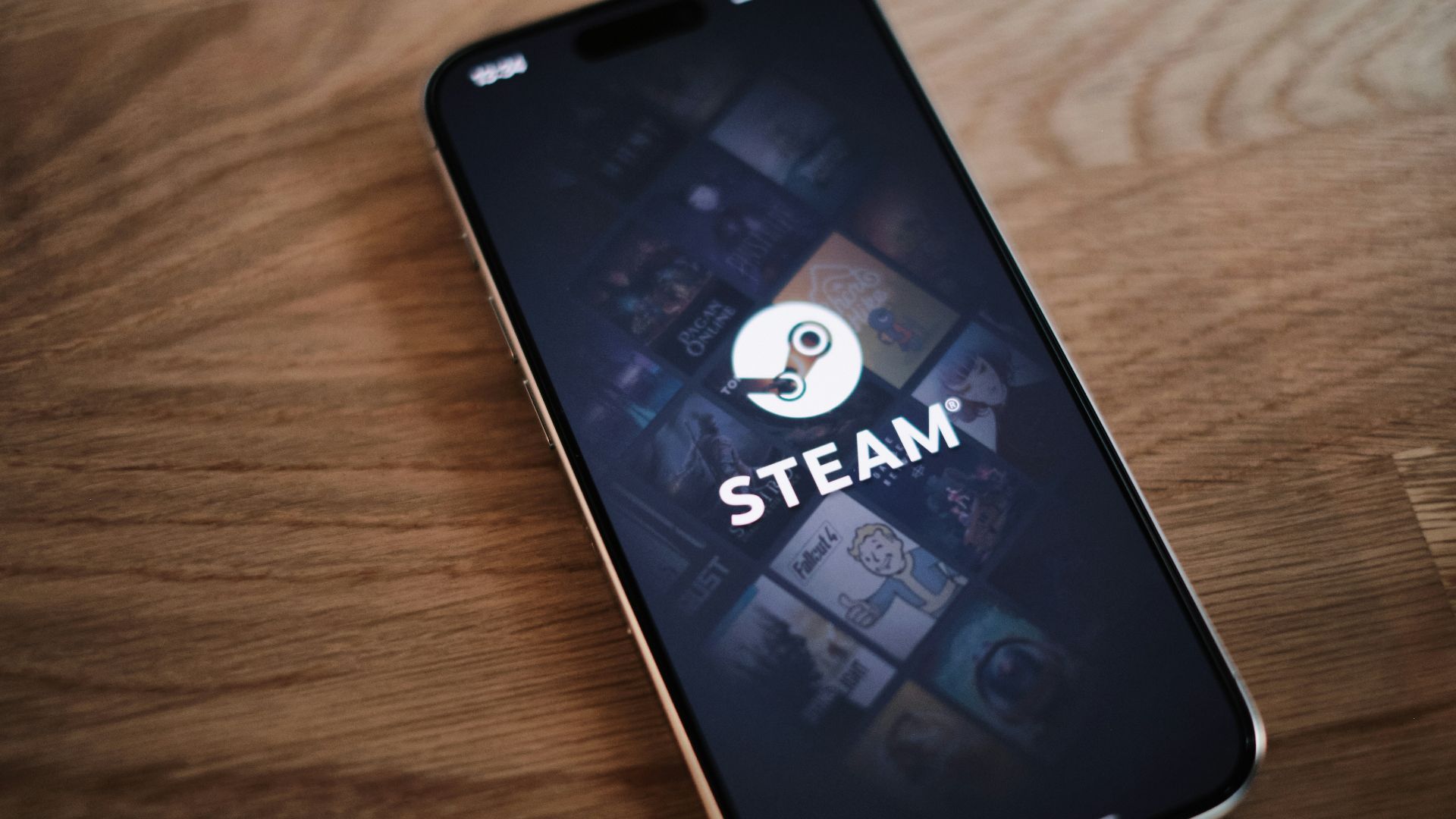 A cell phone sitting on top of a wooden table