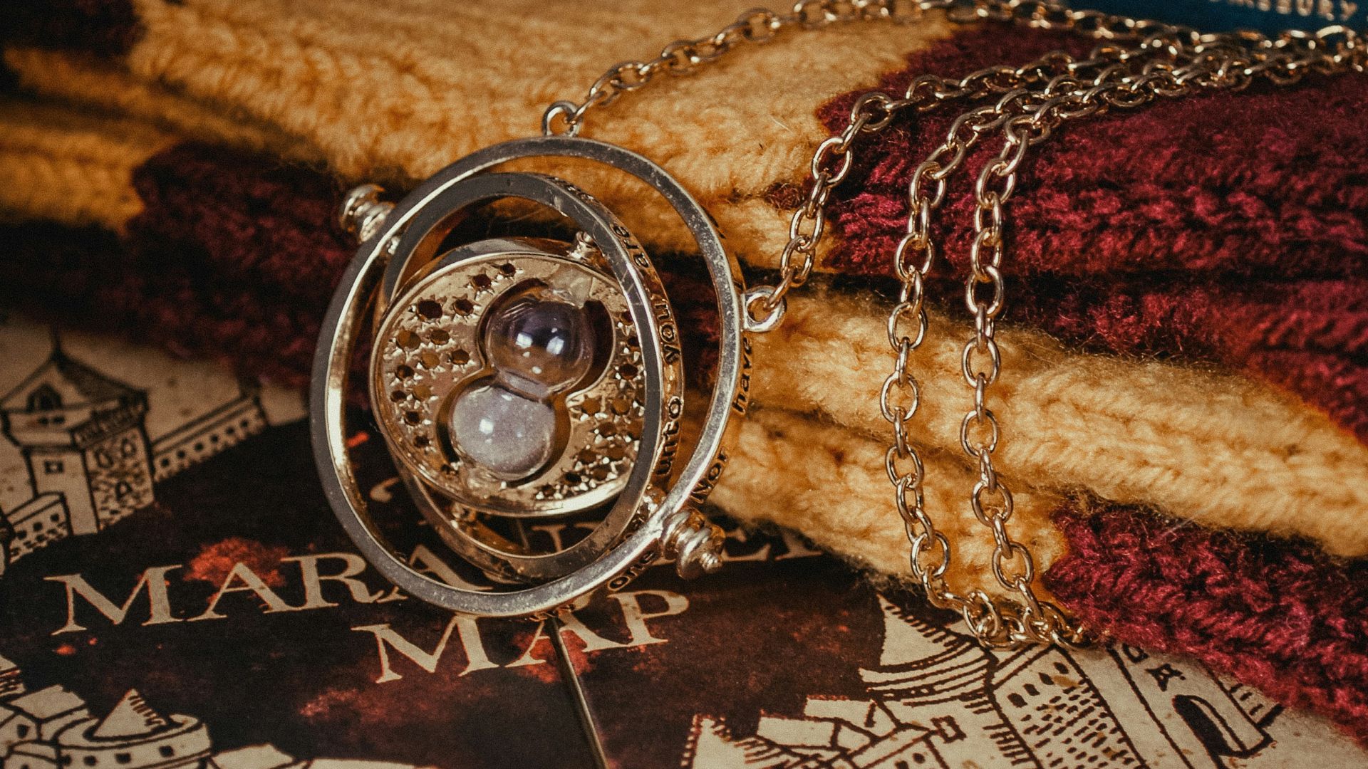 a close up of a necklace on a book