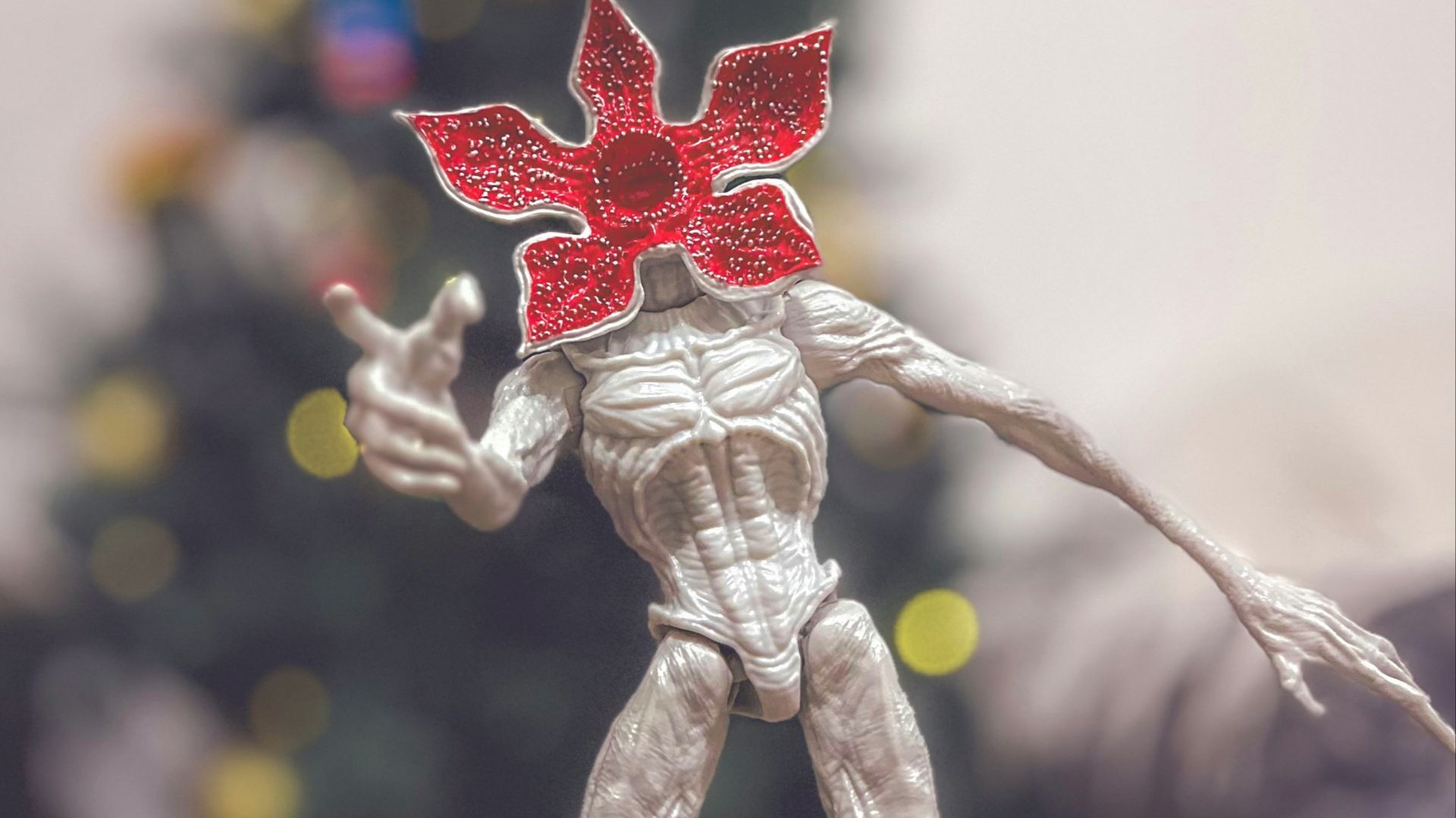 Demogorgon toy in front of a christmas tree