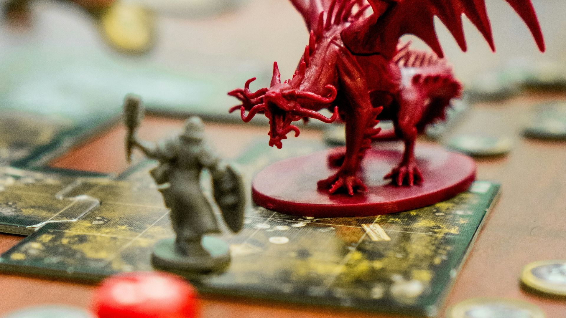 red dragon action figure on table