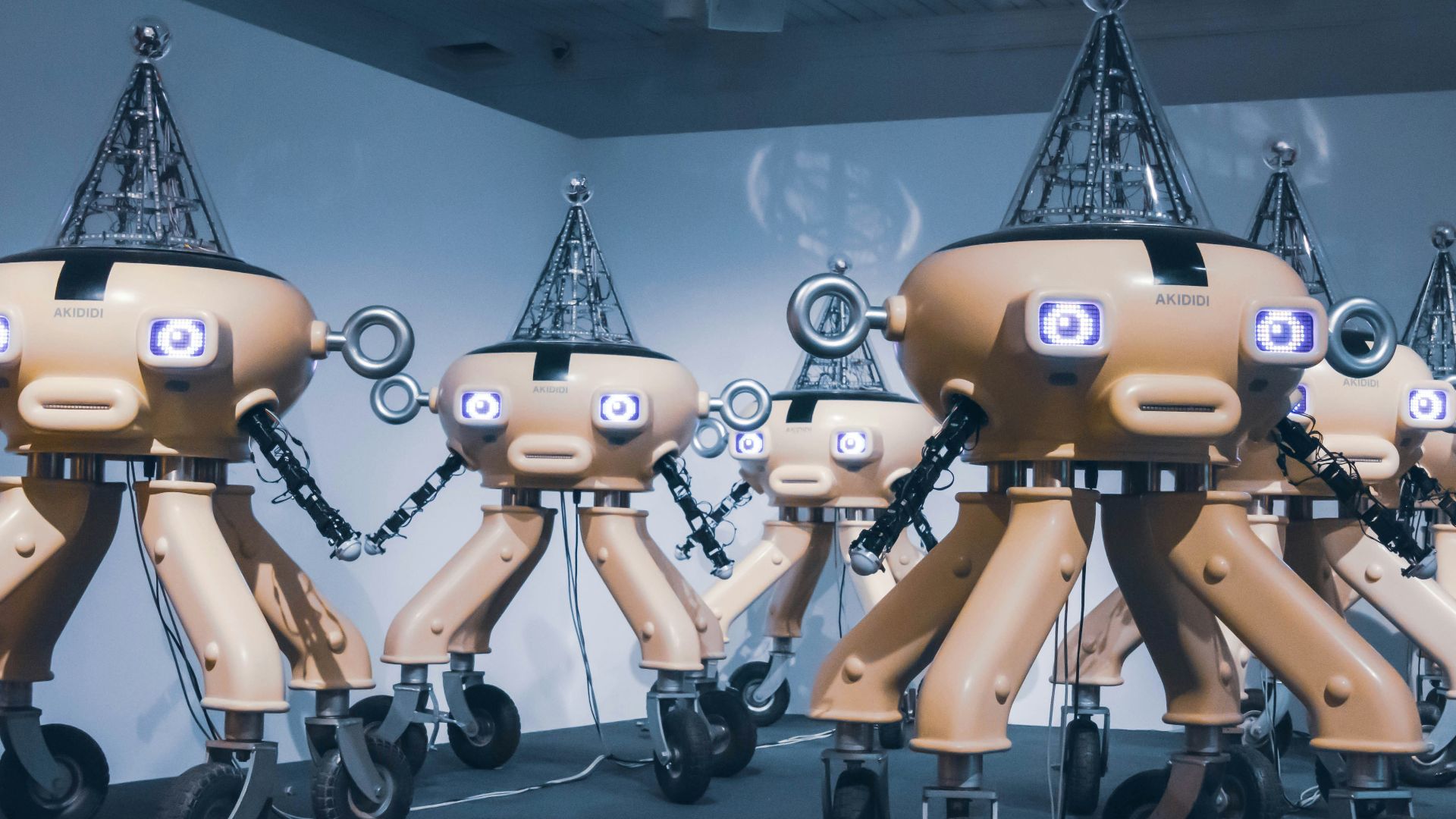 yellow robot toy on black table