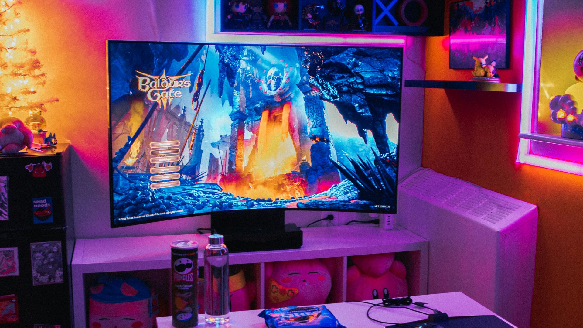 a living room with a television and a game system