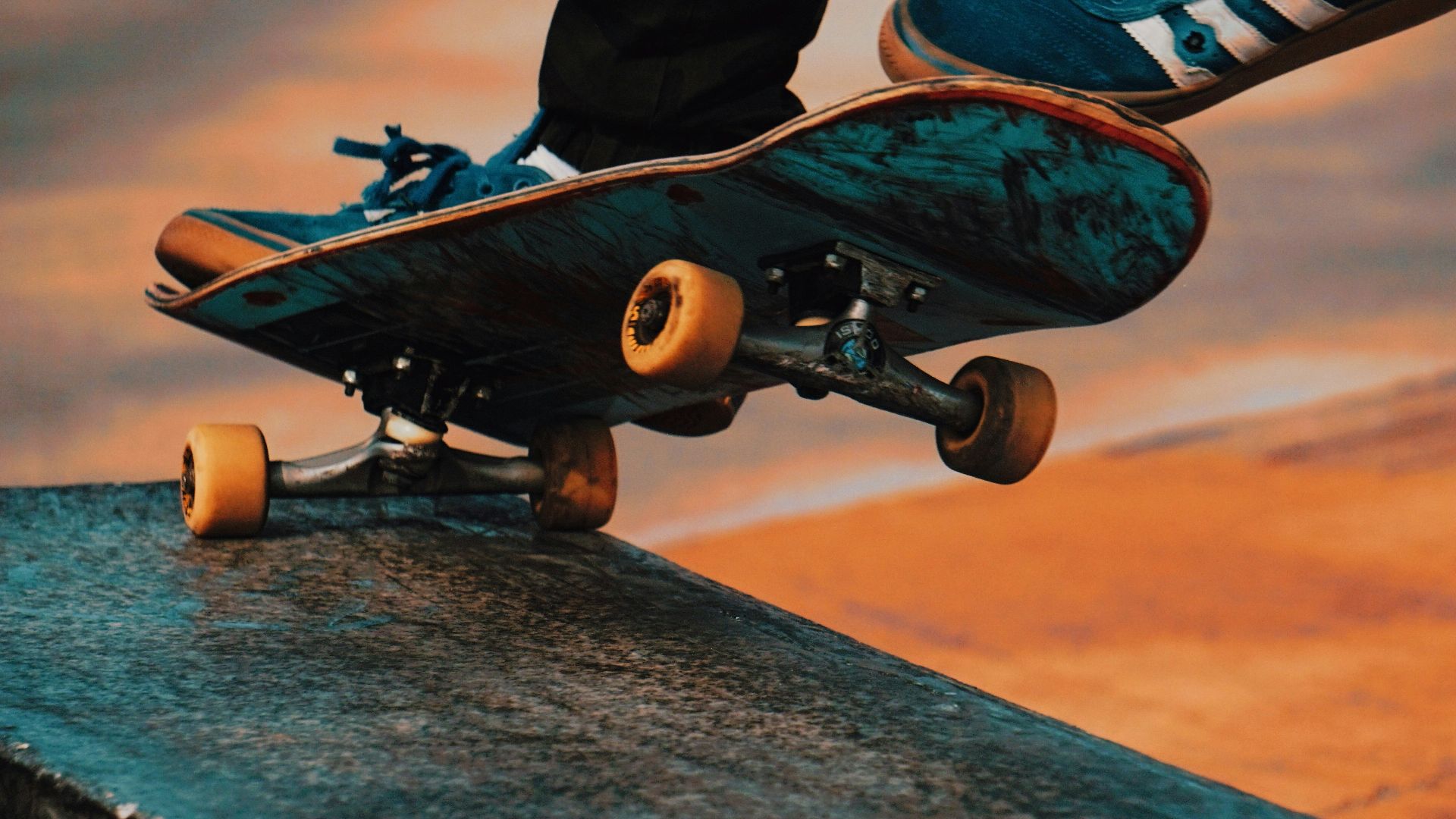 person doing kick flip trick