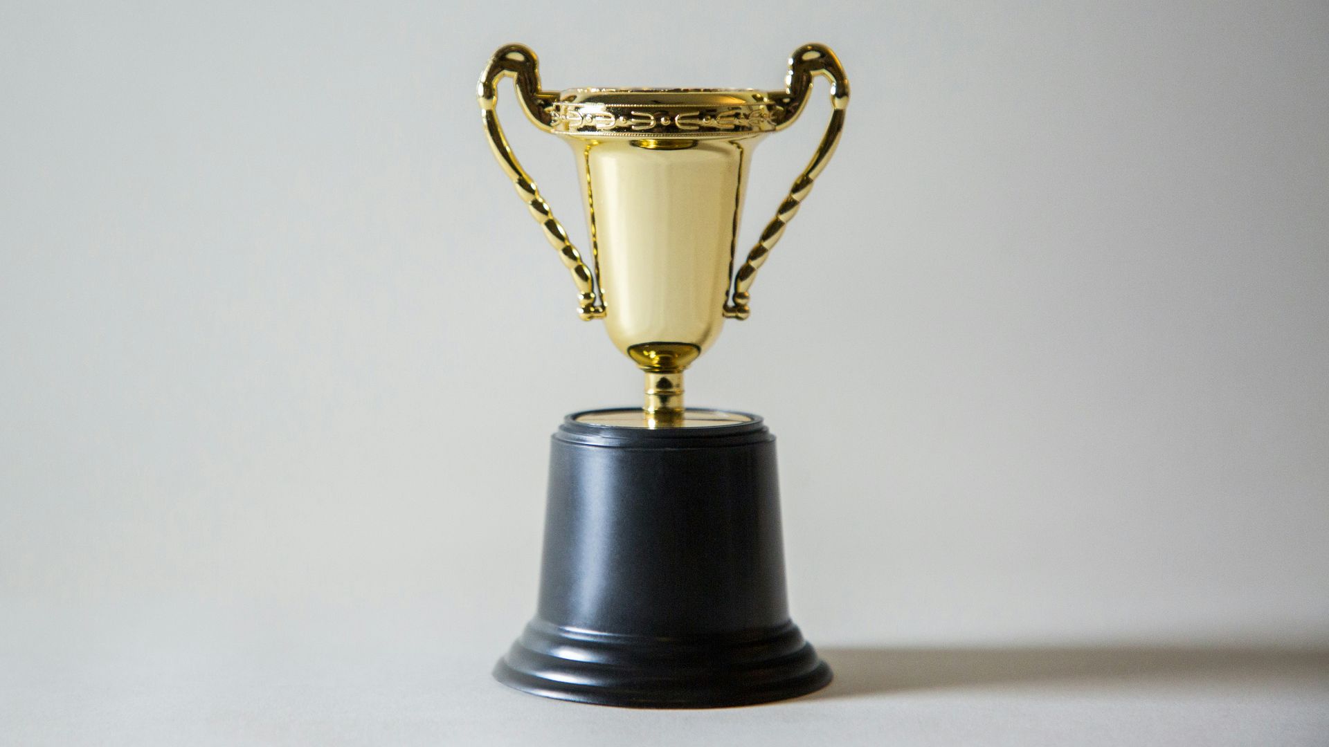 yellow and white trophy