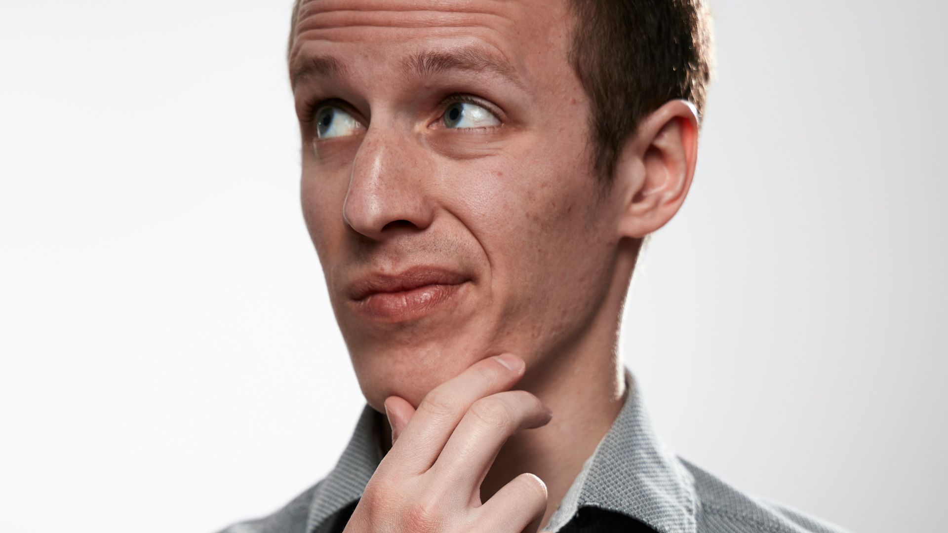 man in gray button up shirt