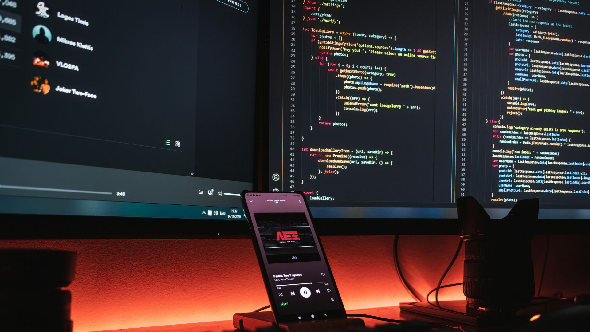 black remote control on red table