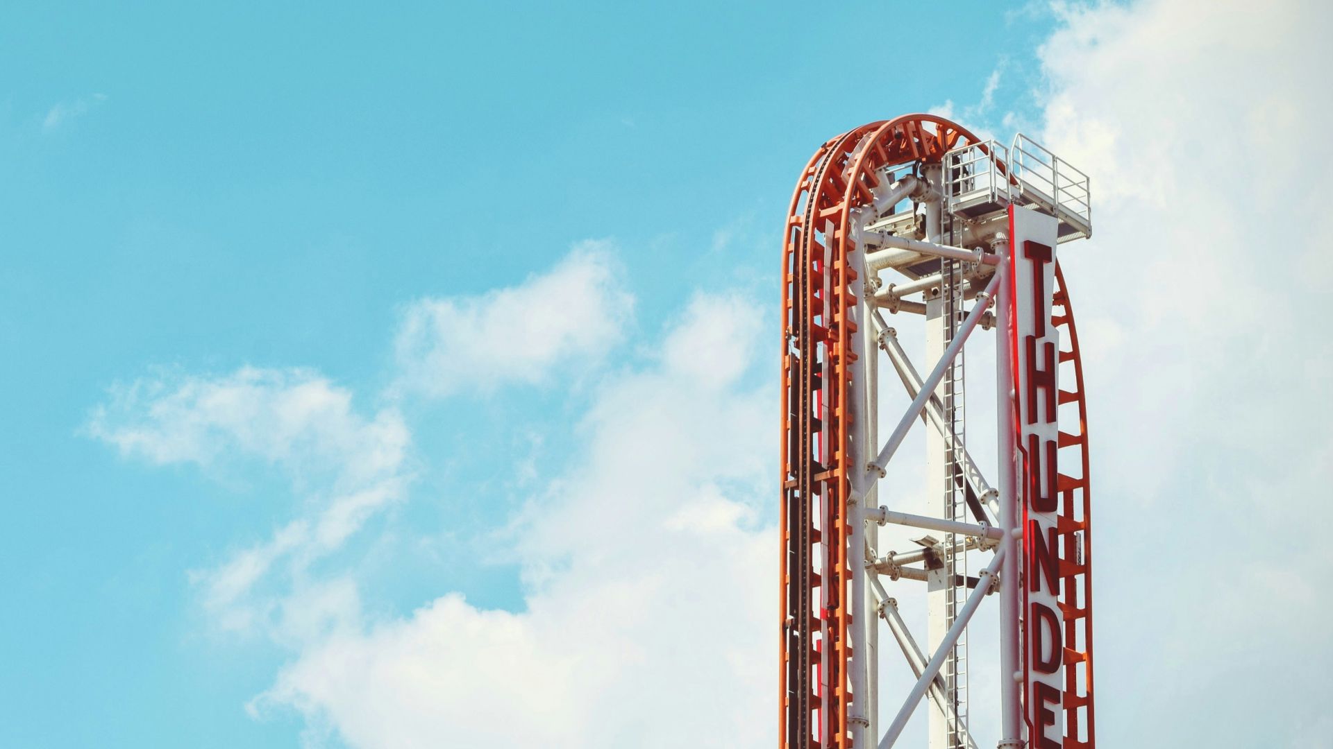 red and white Thunderbolt roller coaster ride