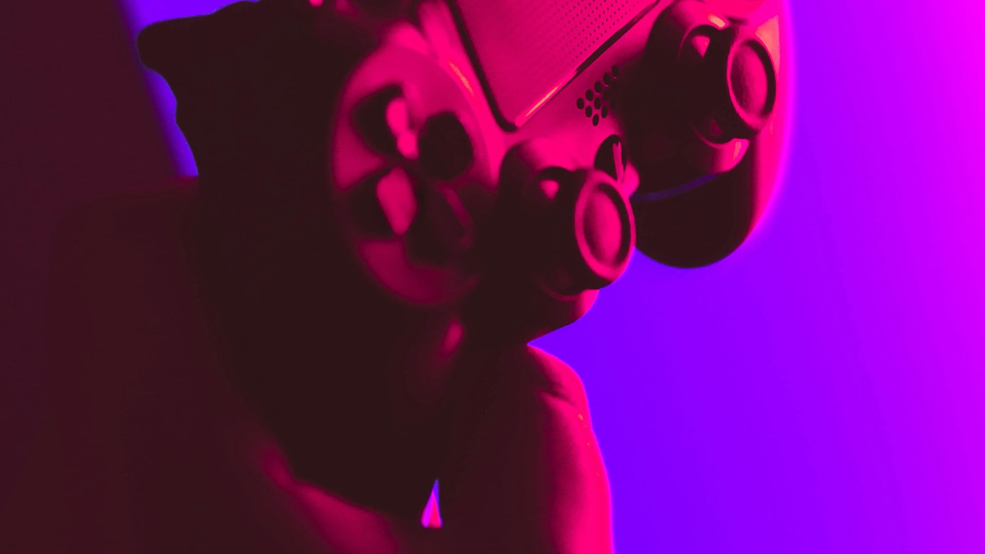 person holding black and gray game controller