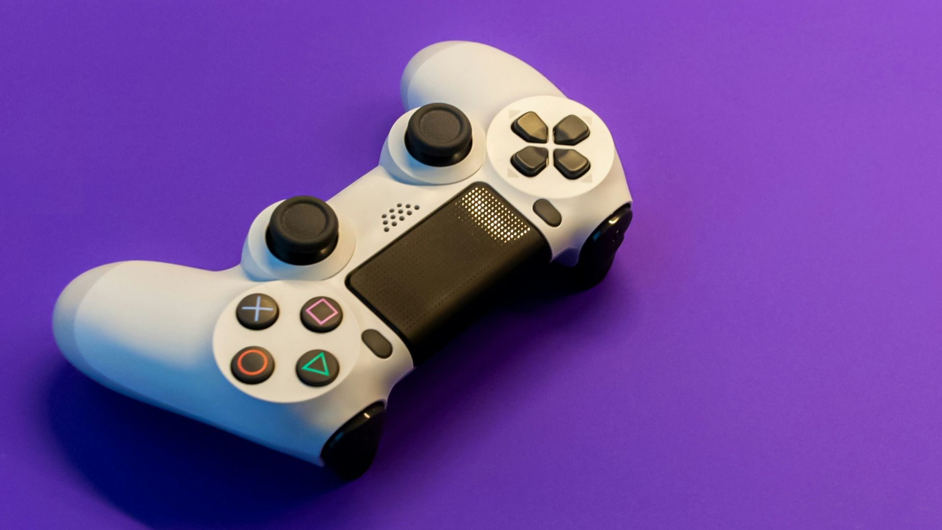 white and black game controller