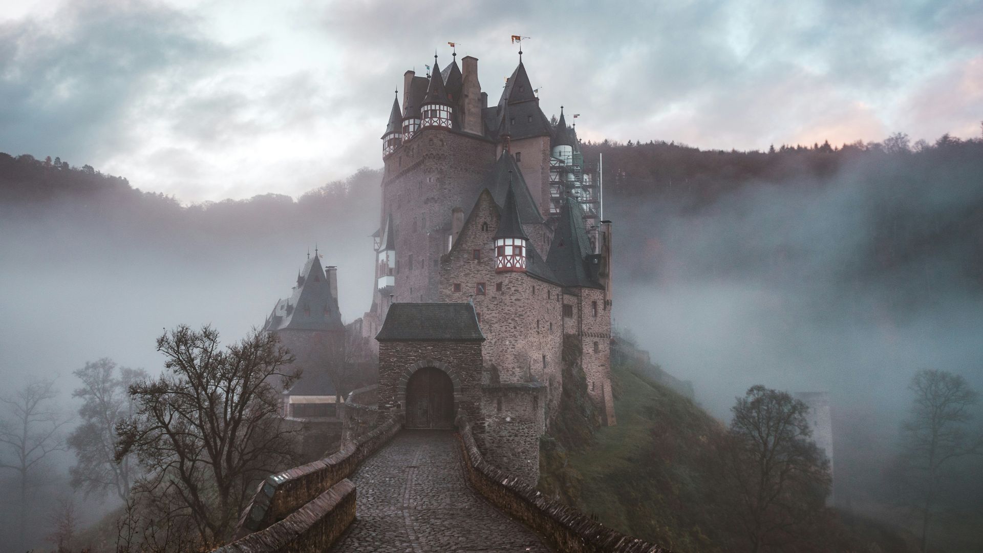 closeup photo of castle with mist