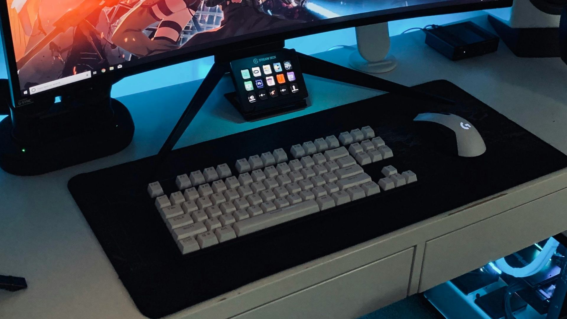 turned on computer monitor with wireless keyboard and mouse