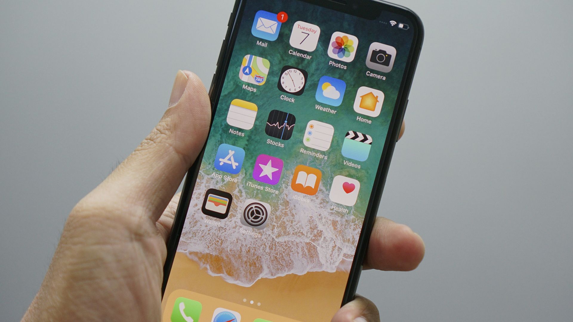 person holding space gray iPhone 7