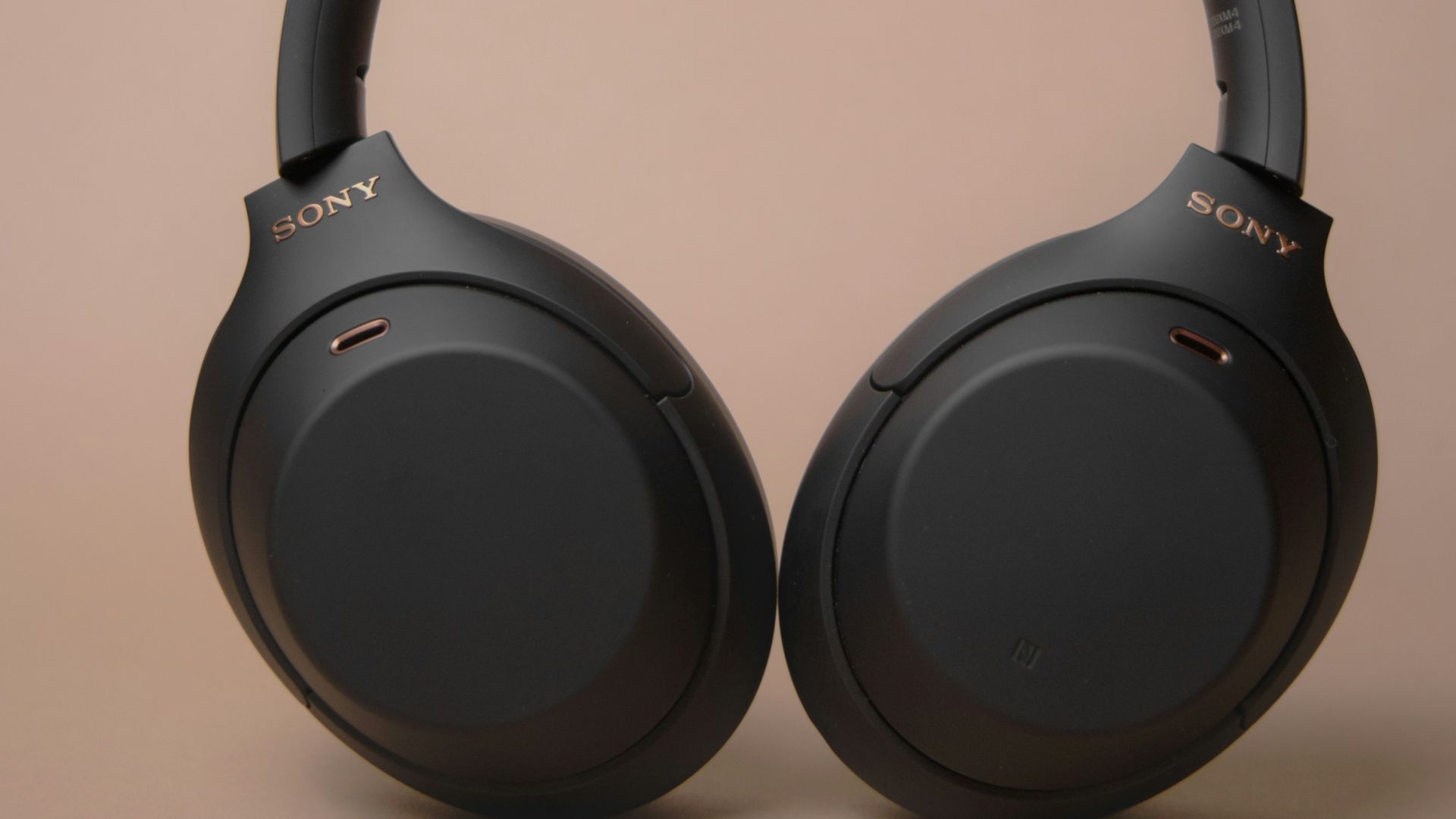 black wireless headphones on white table