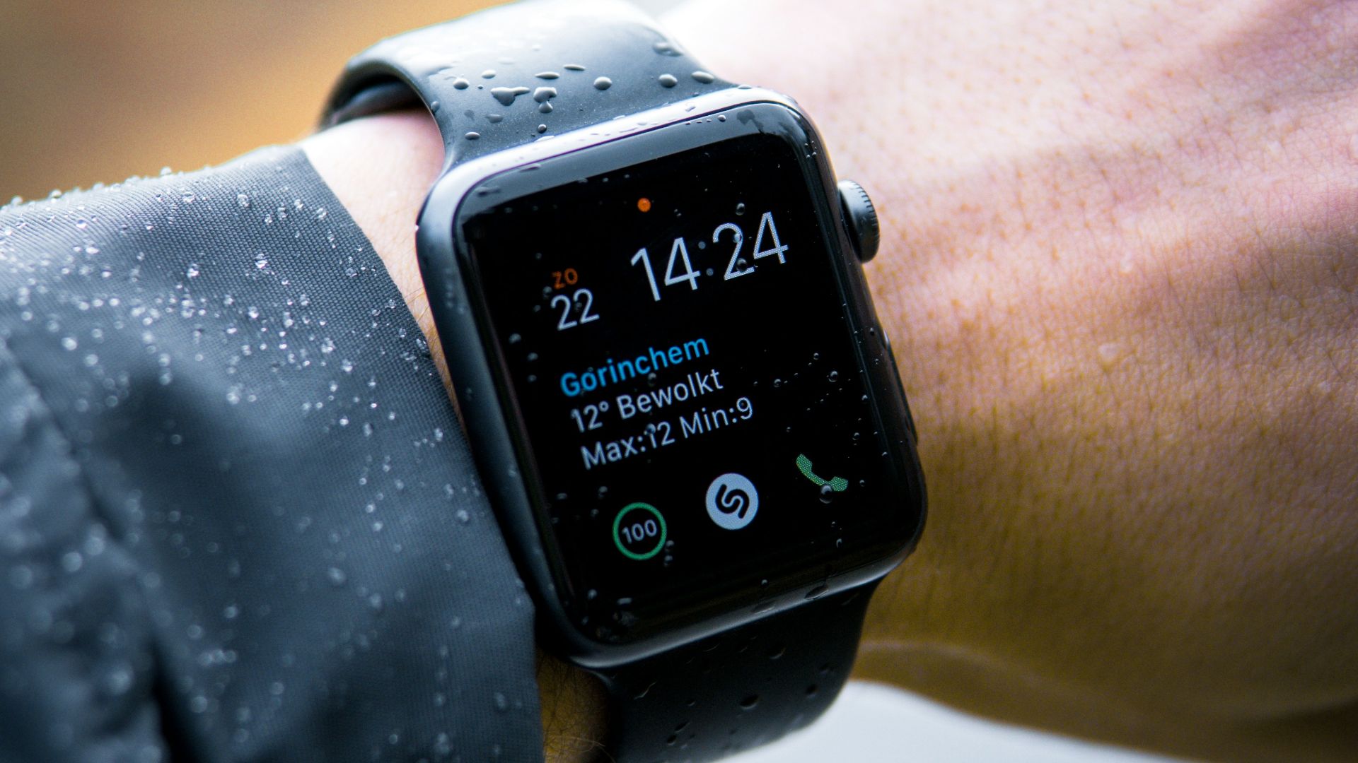 person wearing Apple Watch at 14:24