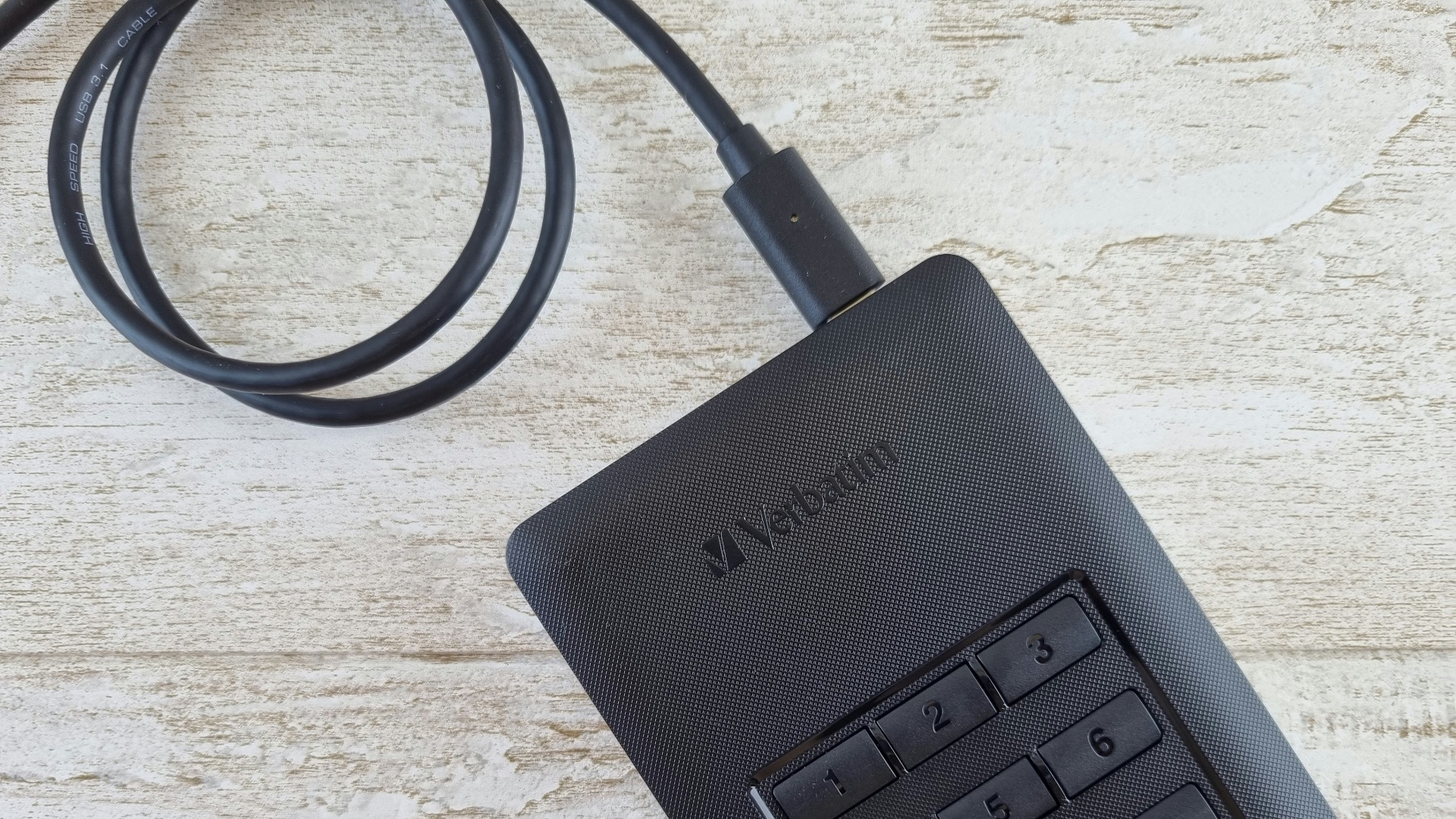 a close up of a cell phone on a table