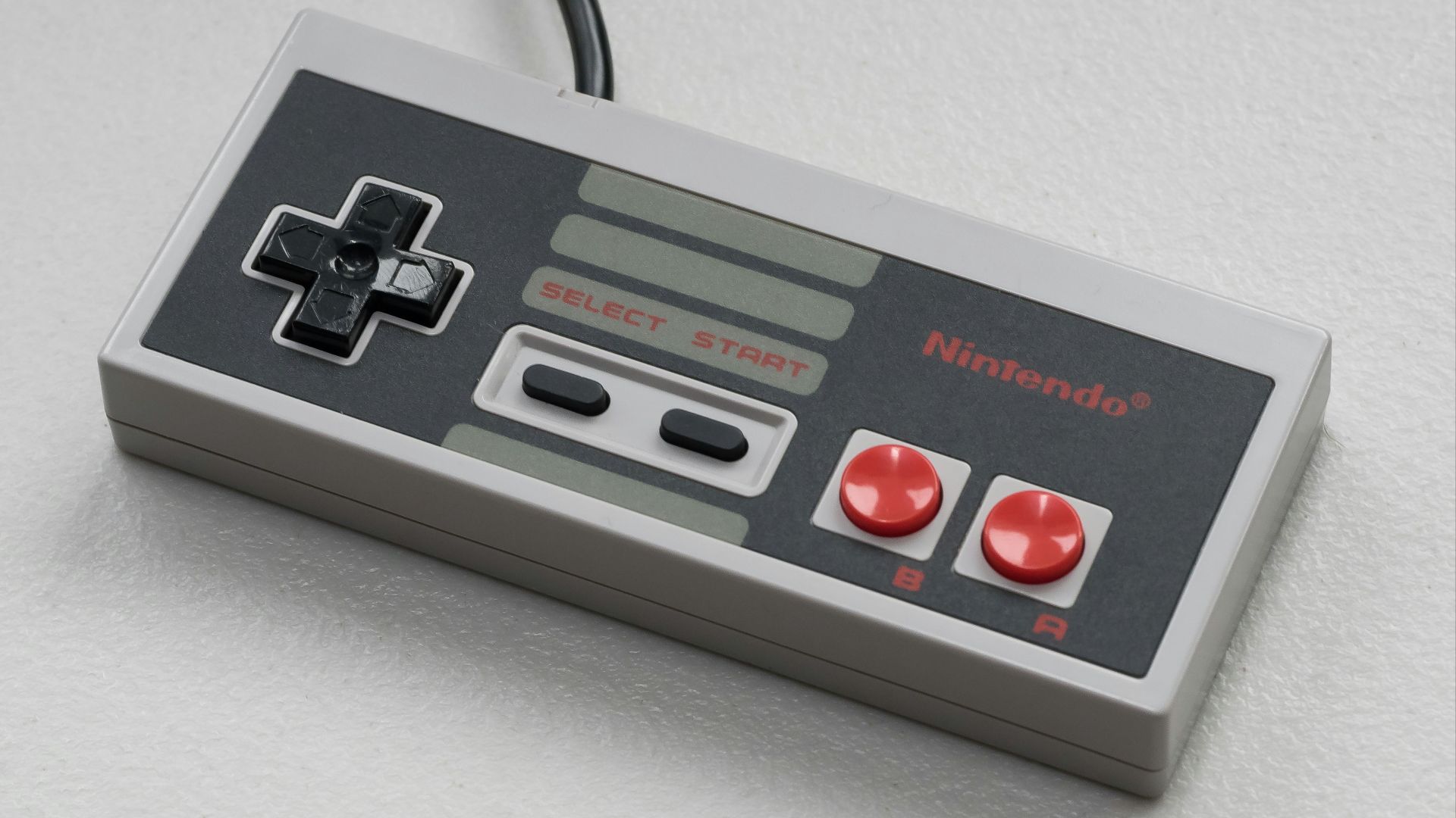 a close up of a nintendo game controller