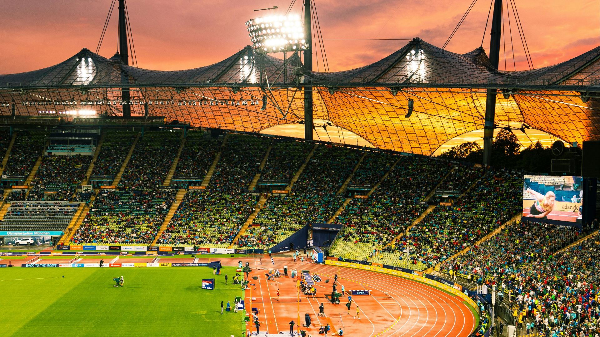 a baseball stadium with a crowd of people in it