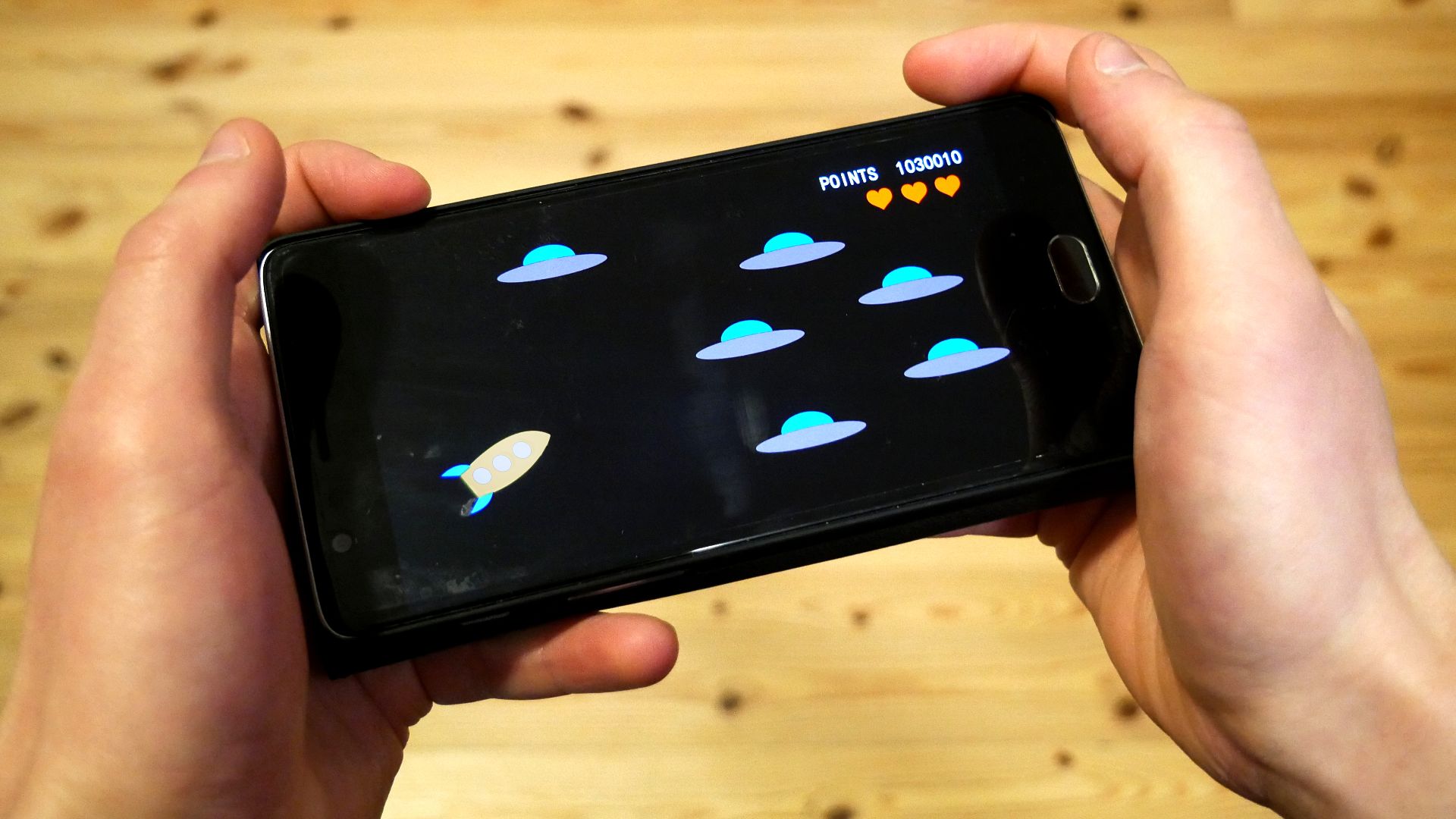 File:Playing with smartphone.jpg