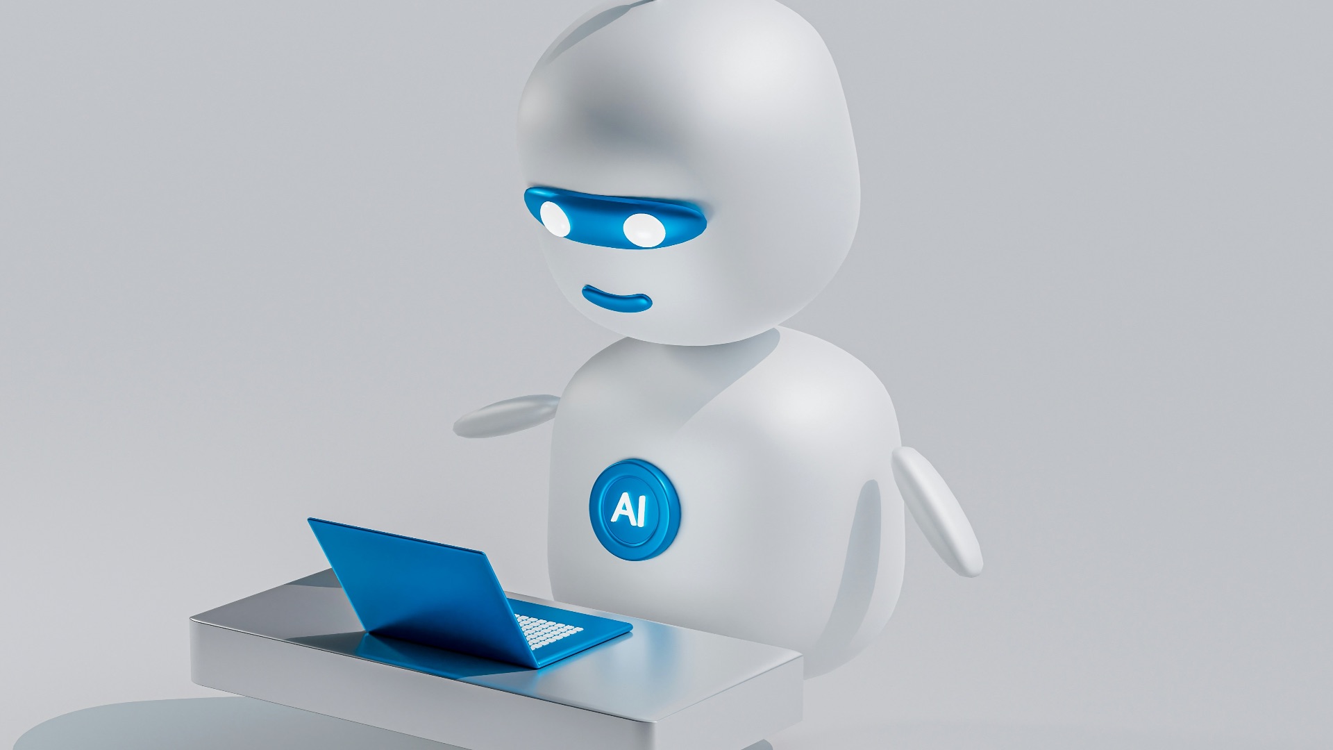a white robot with blue eyes and a laptop