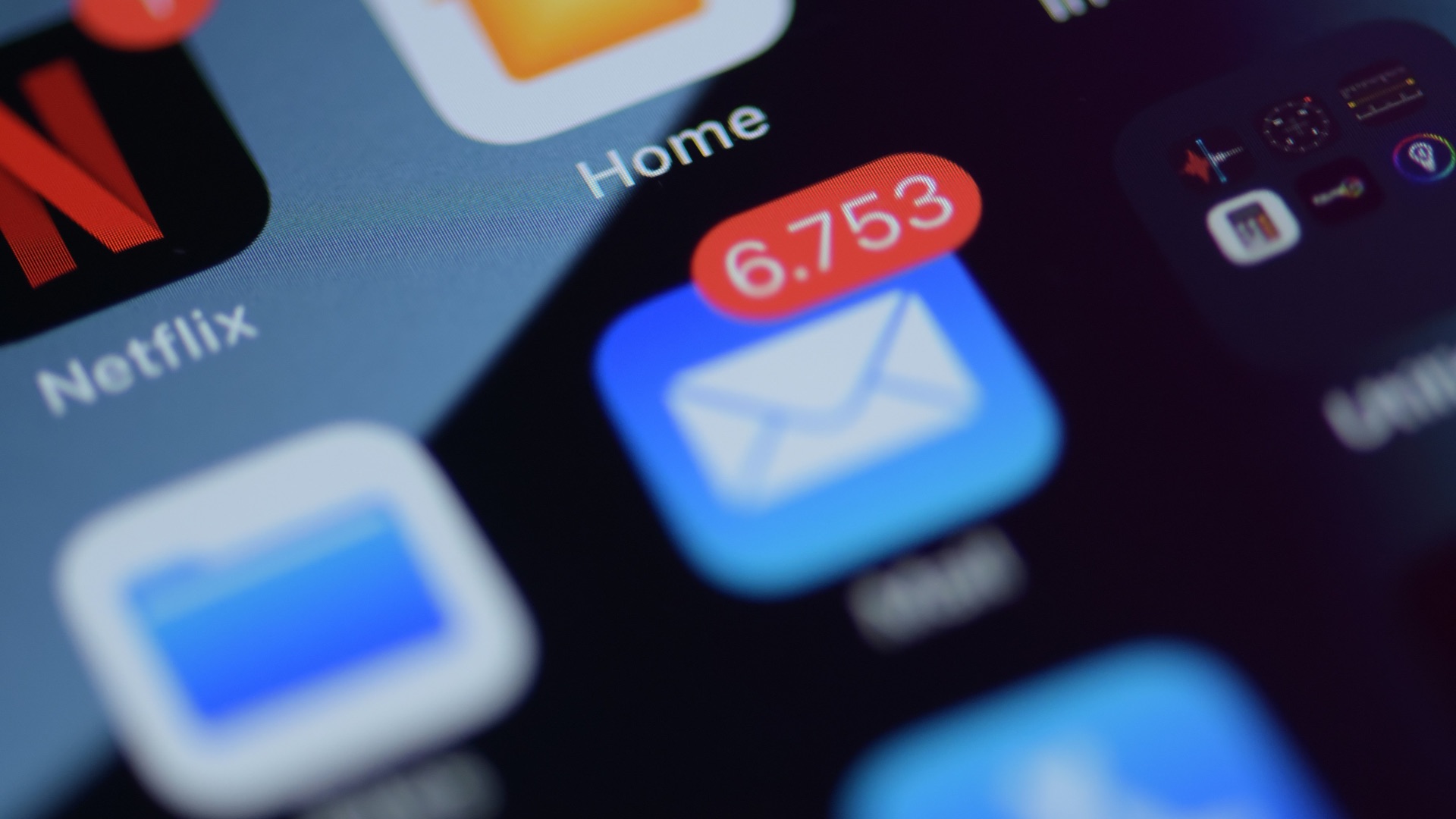 a close up of a cell phone with various app icons