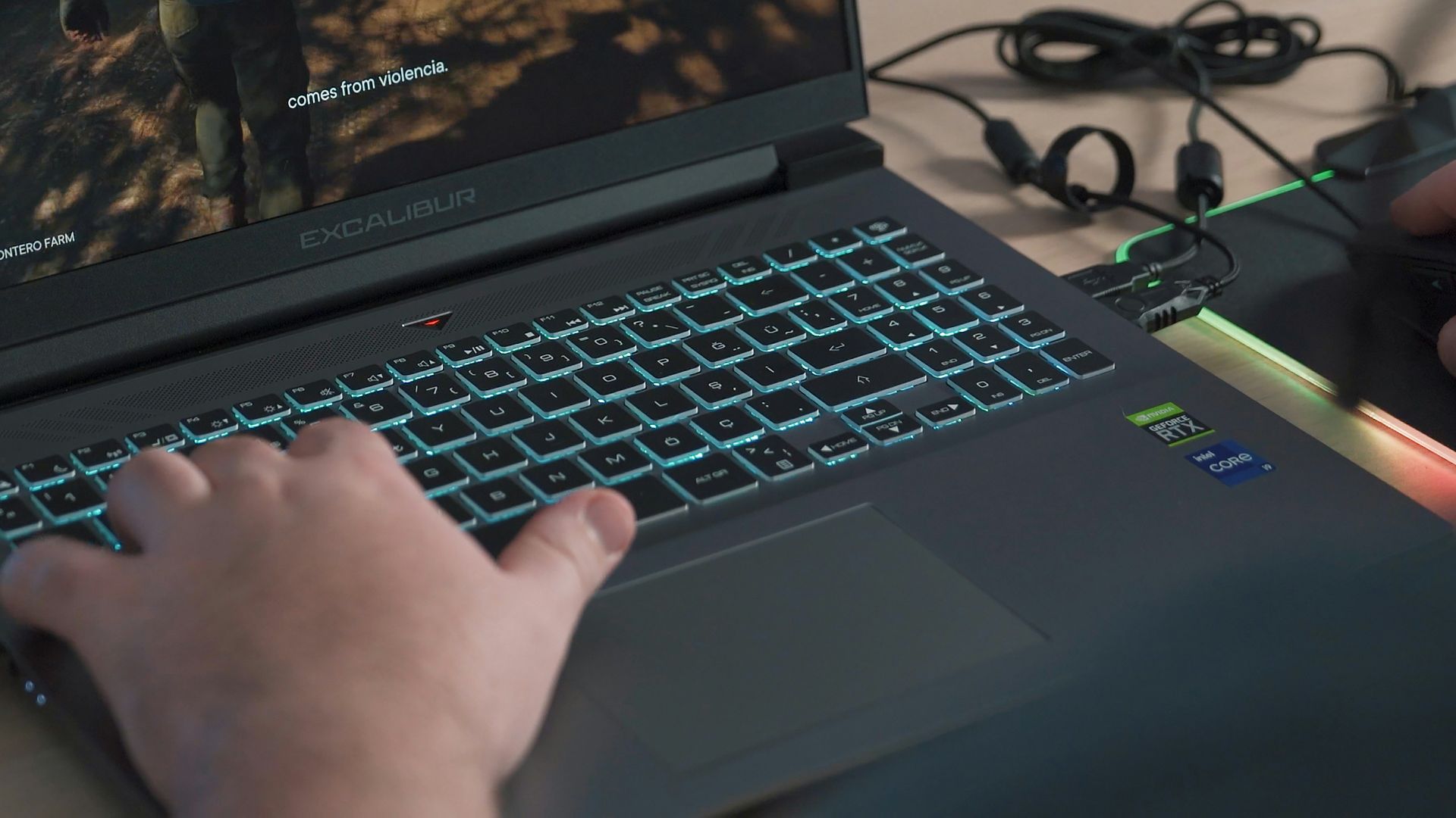 a person playing a video game on a laptop