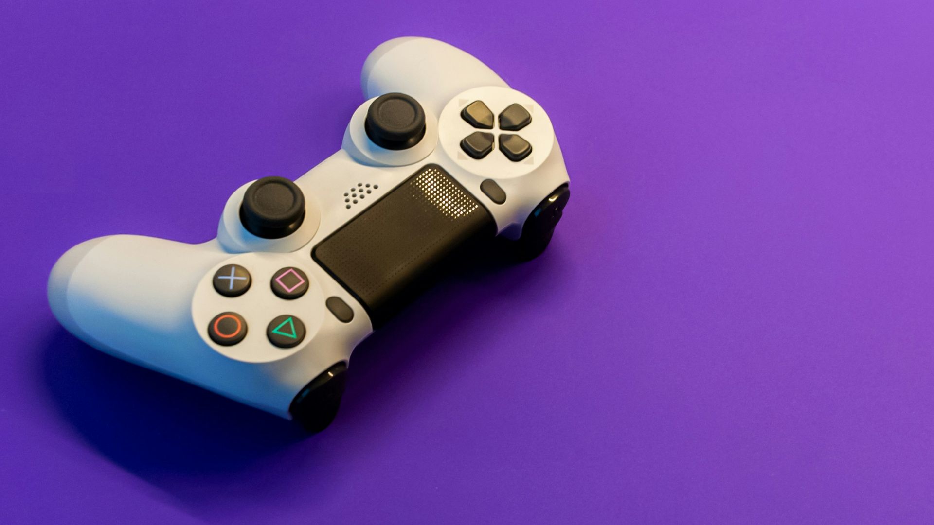 white and black game controller