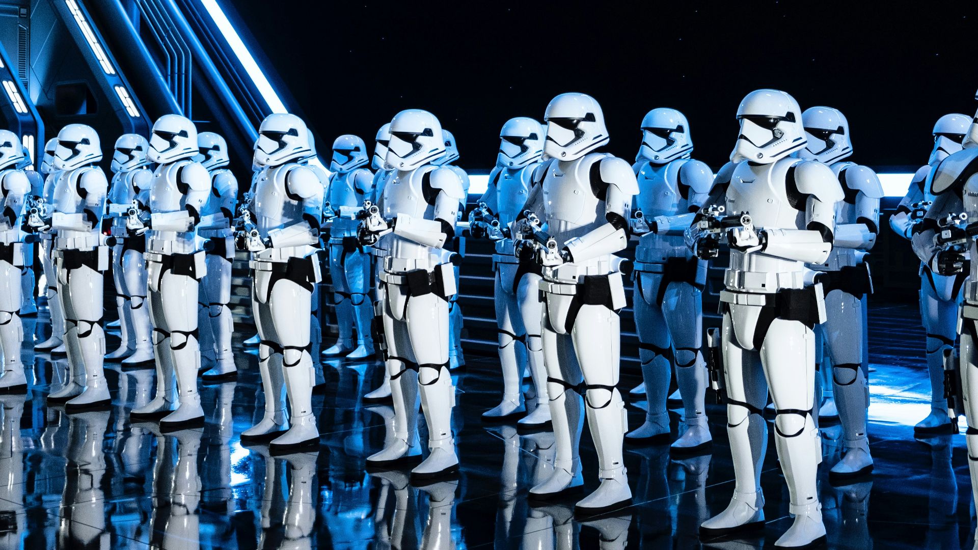 white robot toy on black background