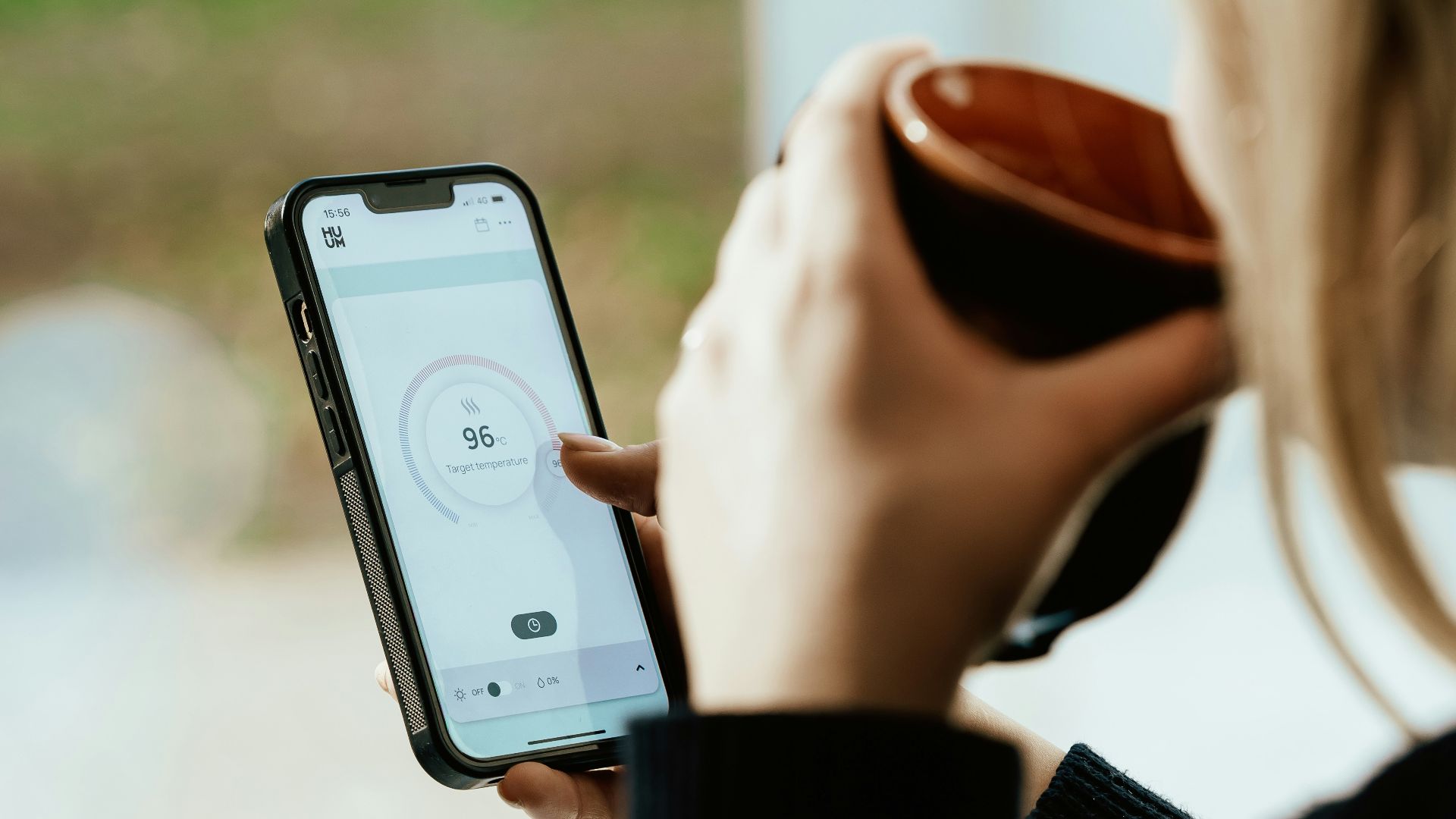 a person holding a cell phone