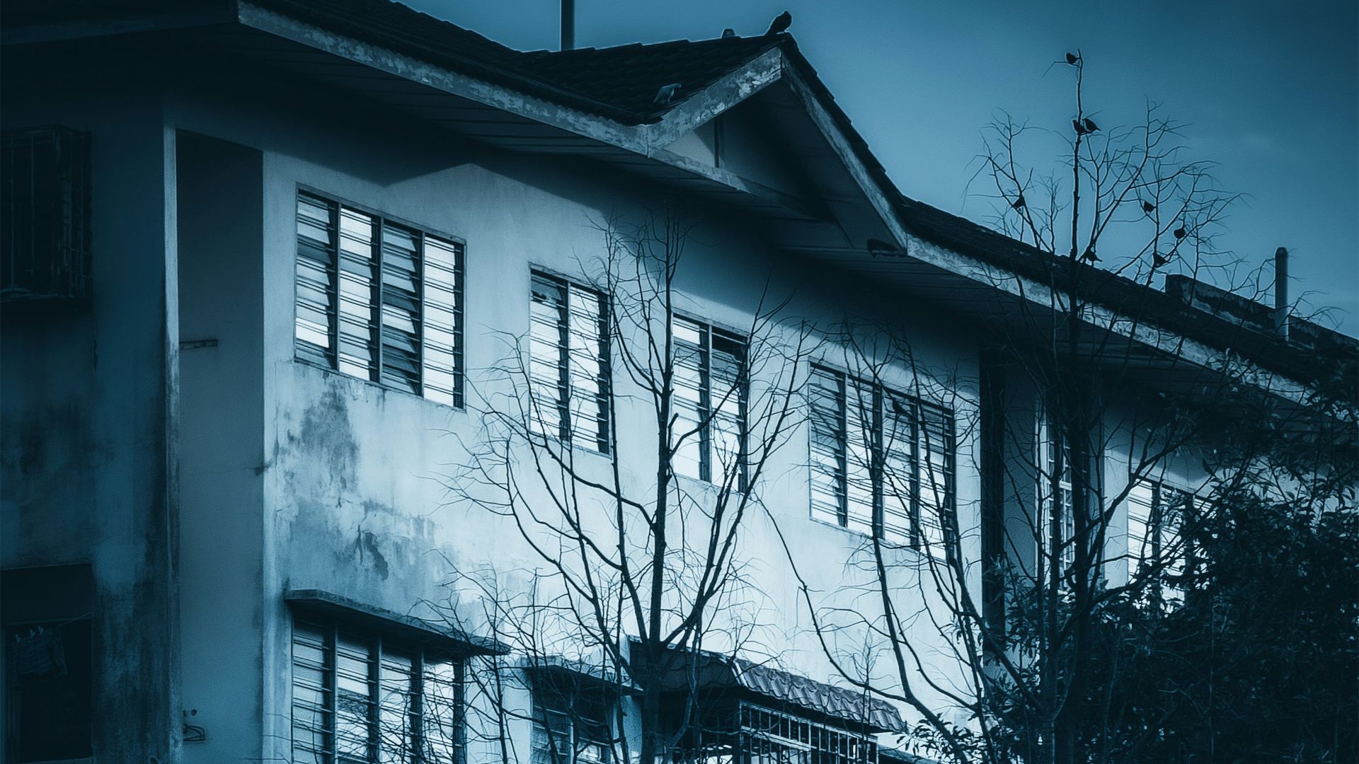 An old building with a clock tower in the background