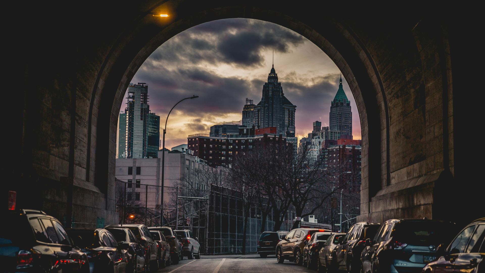 cars parked on side of road during daytime