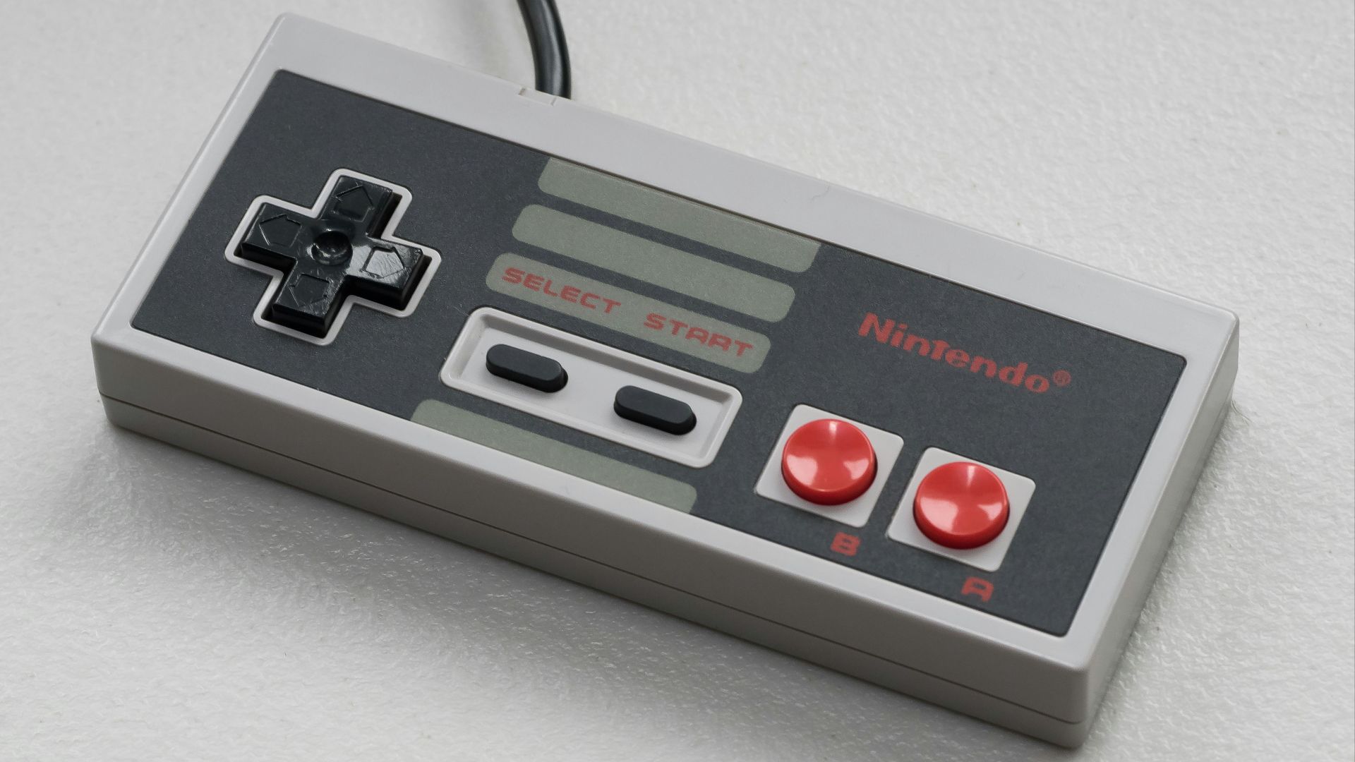 a close up of a nintendo game controller
