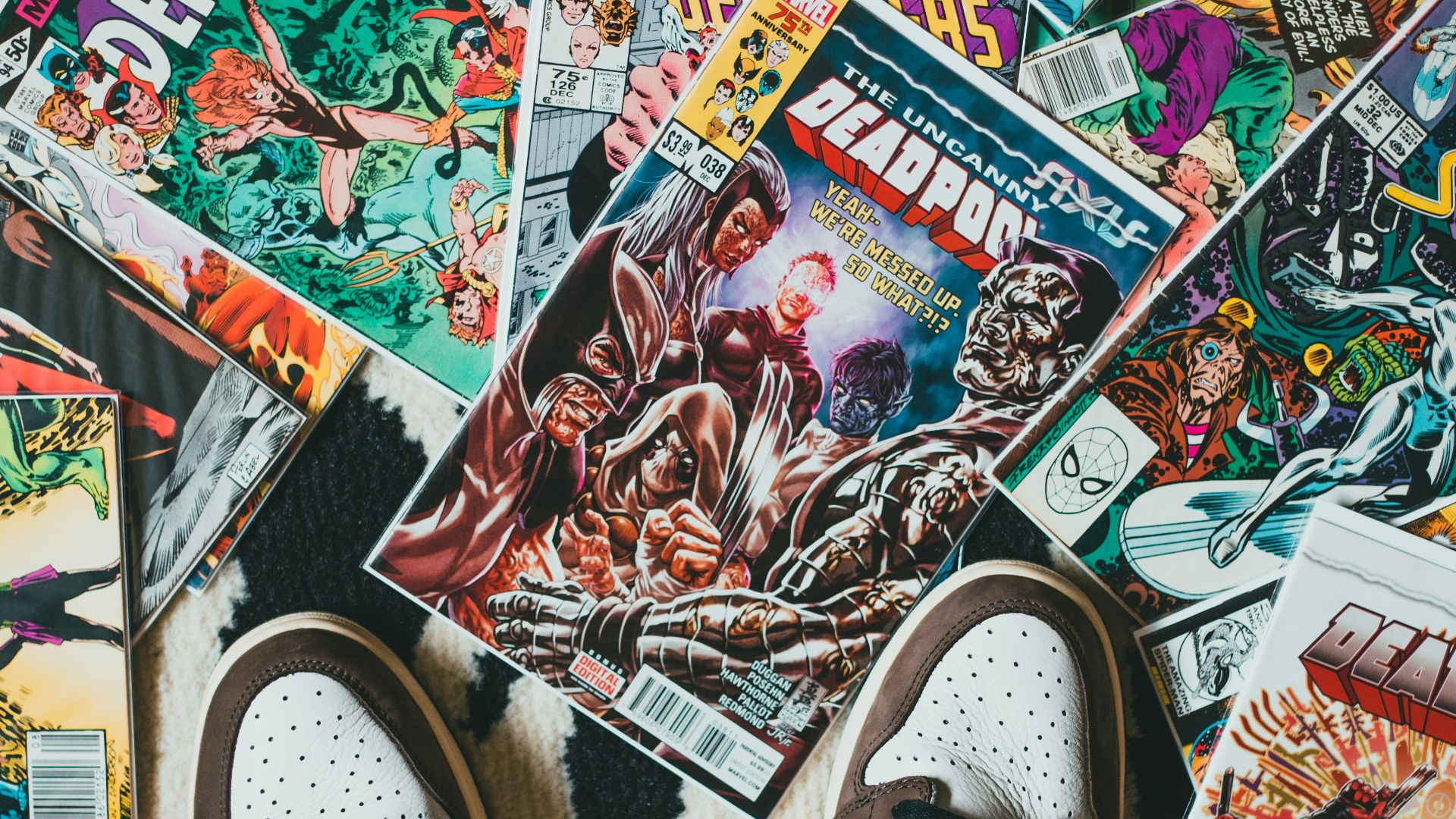 person wearing black and white sneakers