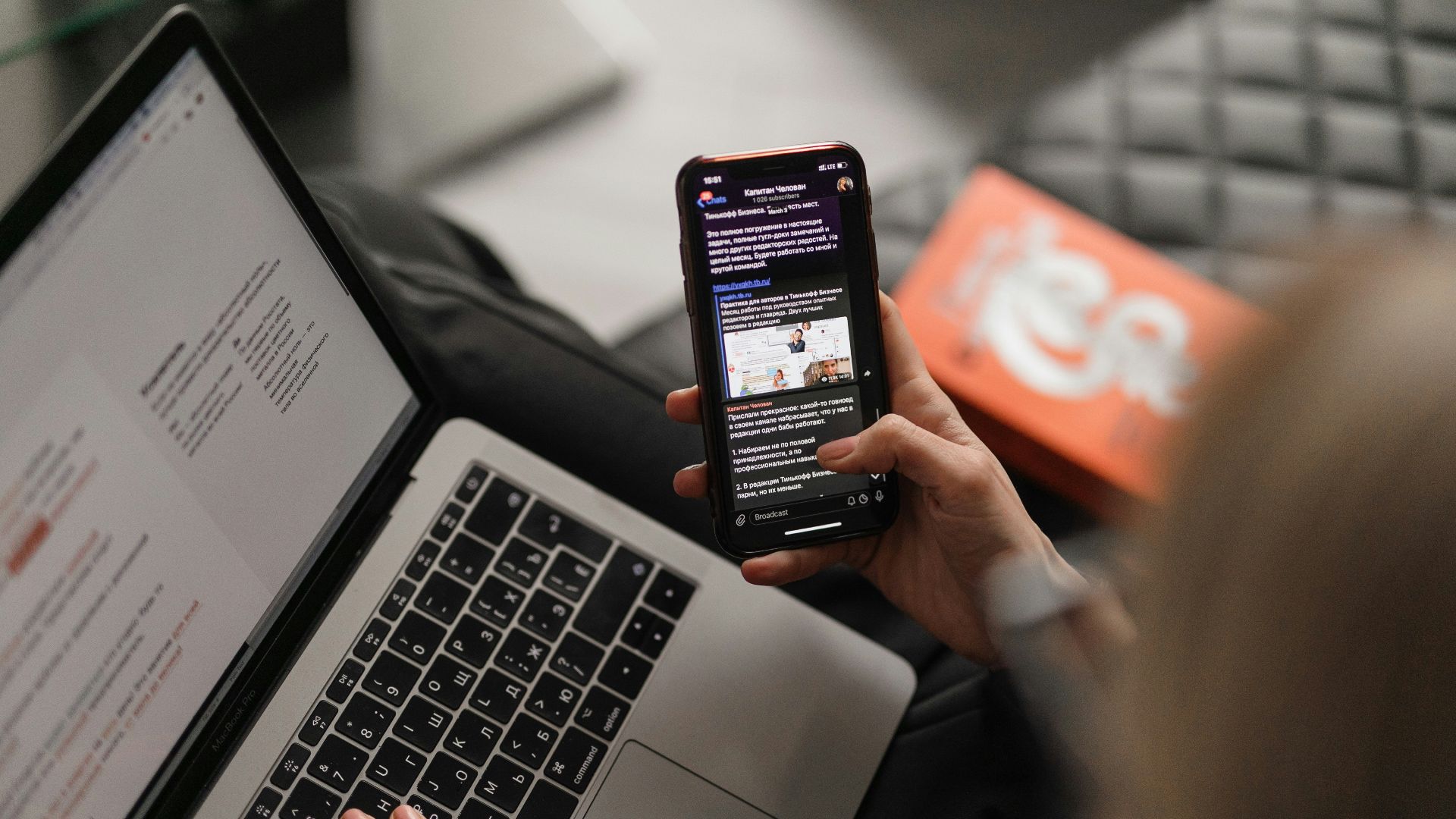 person holding black iphone 4