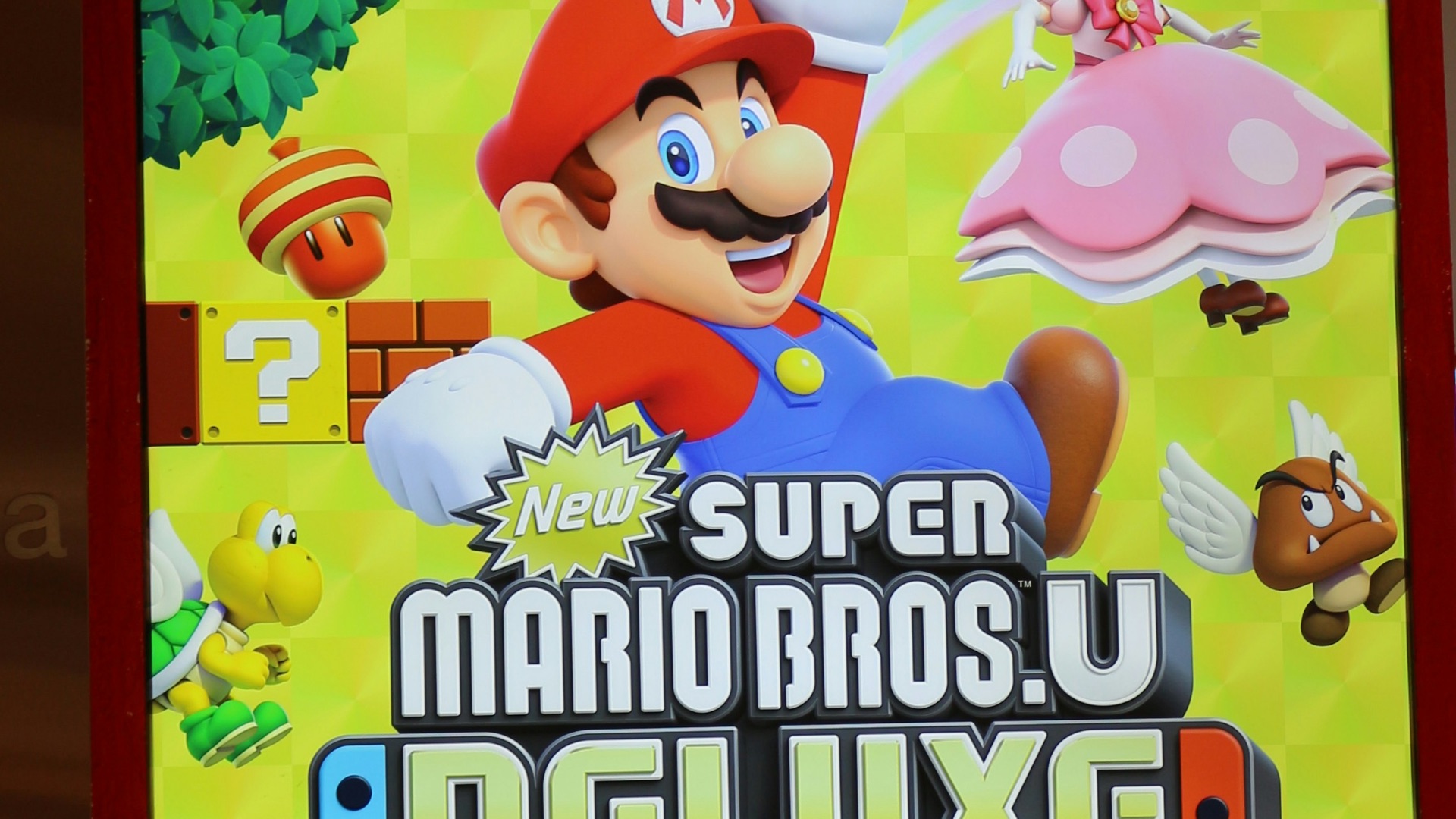 a nintendo switch advertisement in a store