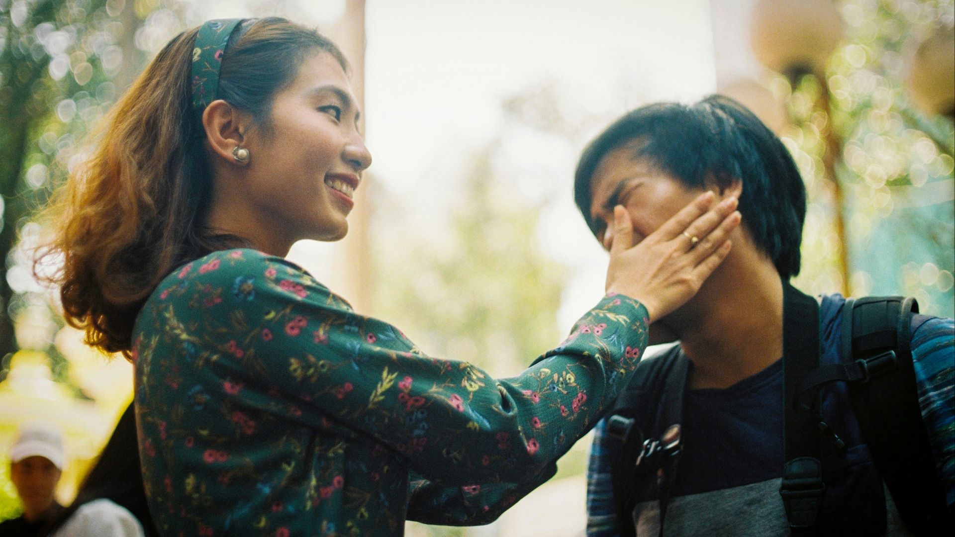 a man and a woman standing next to each other