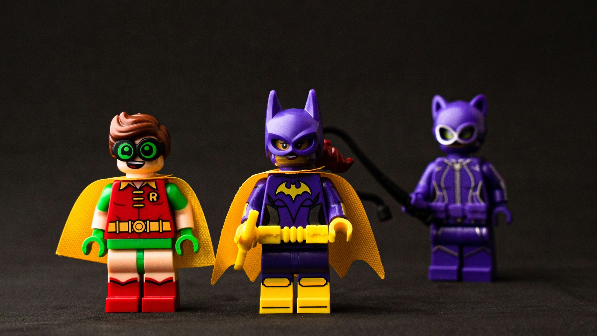 two yellow and purple robot toys