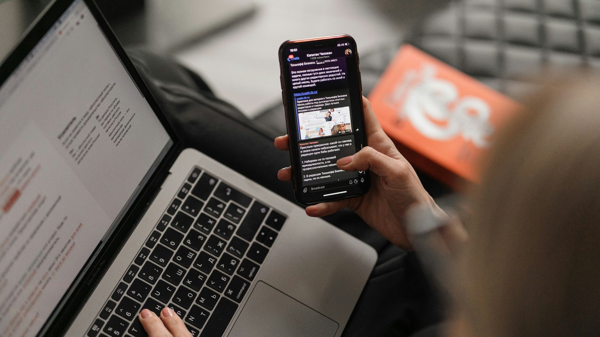 person holding black iphone 4