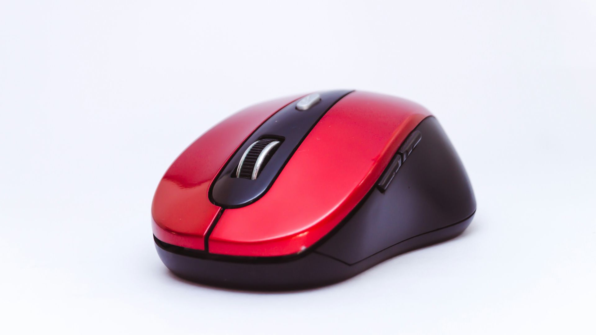 black and red cordless computer mouse