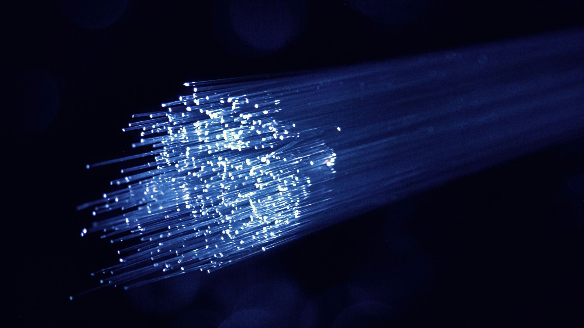 white and blue light on dark room